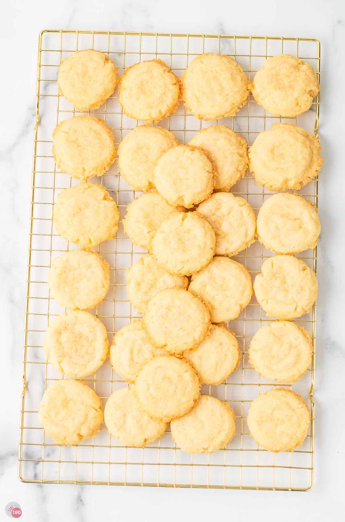 sugar cookies on a wire cooling rack