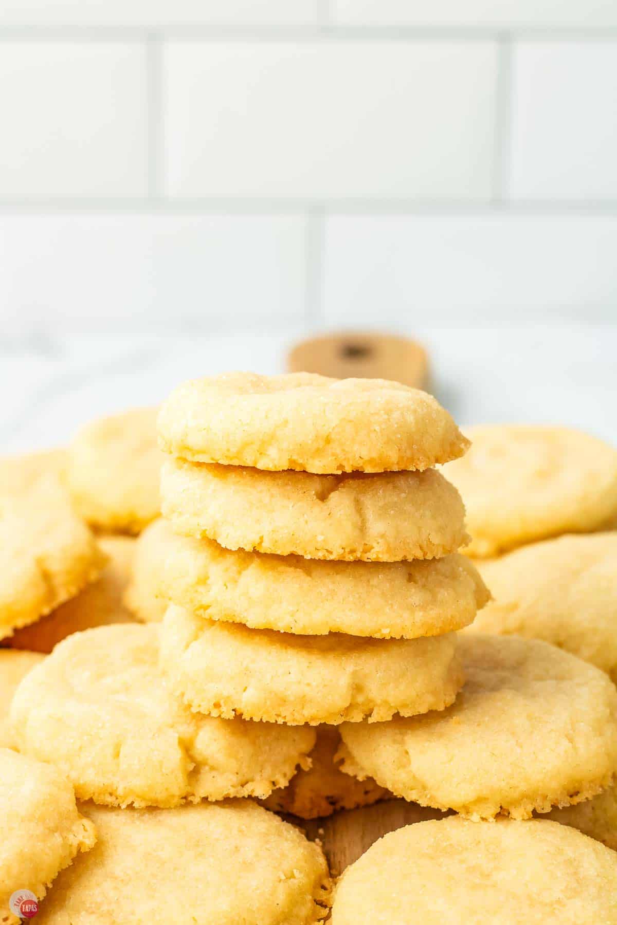 stack of four cookies on a plate of cookies