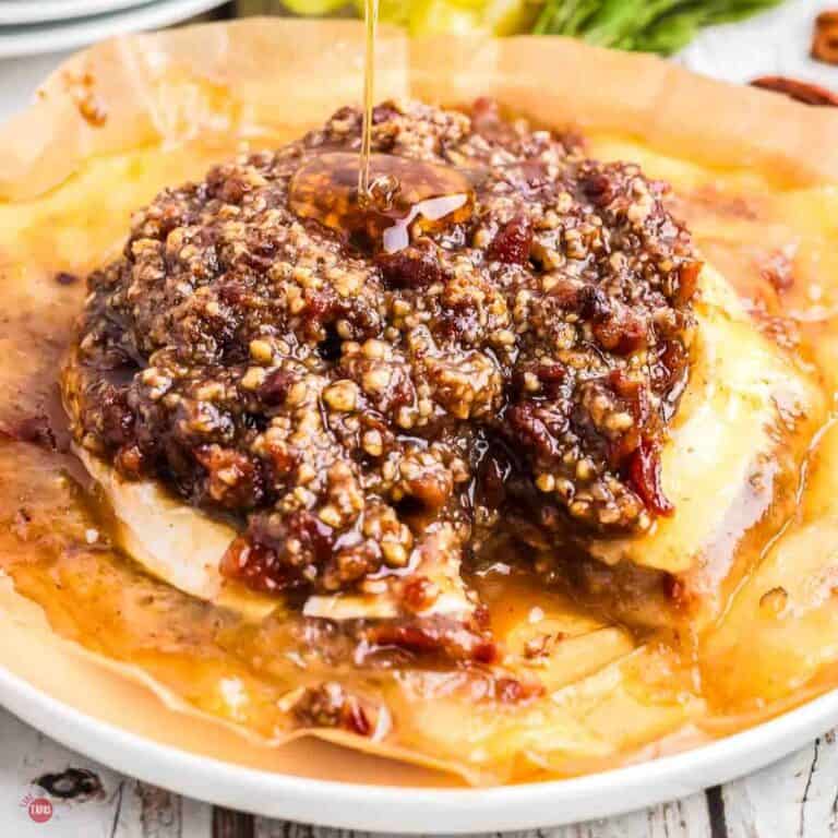 baked brie with pecan and bacon jam on top