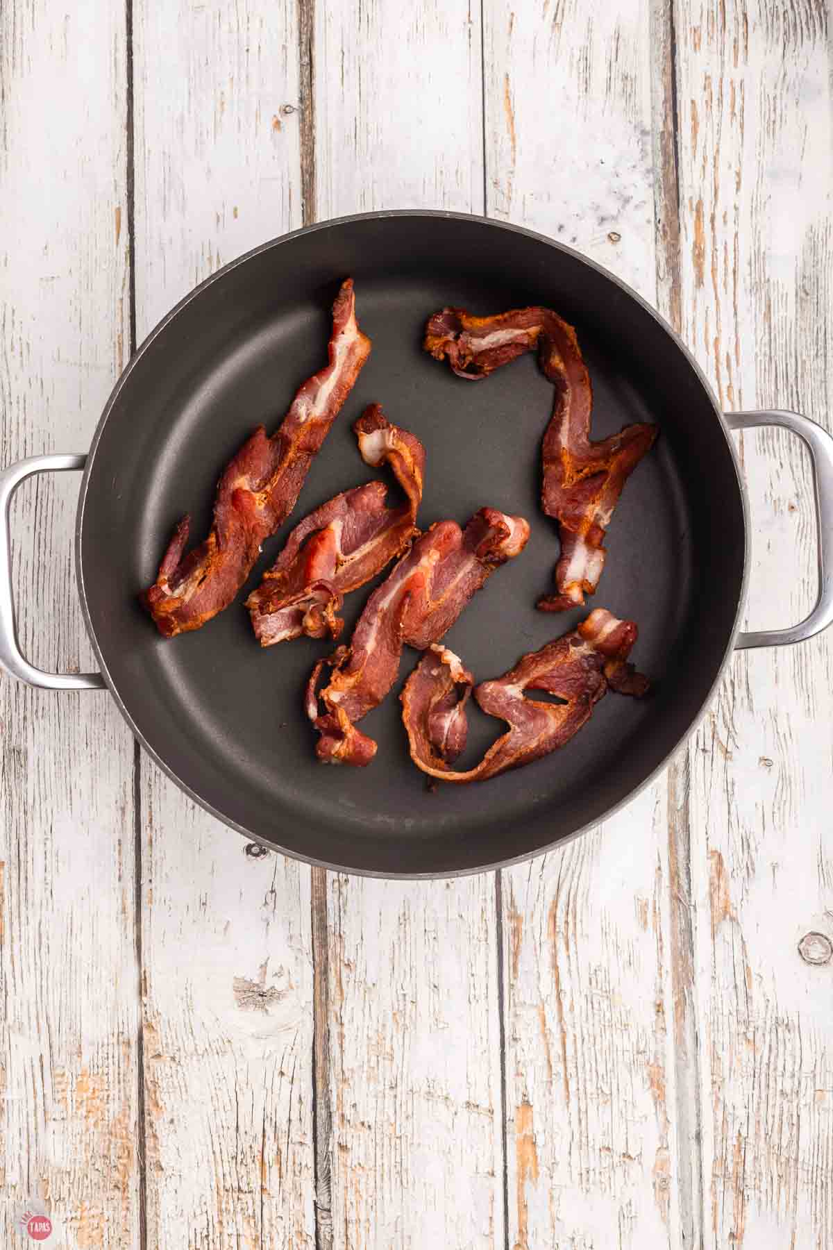 cooked bacon in a skillet