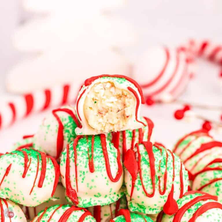 stack of cake balls with red and green decorations