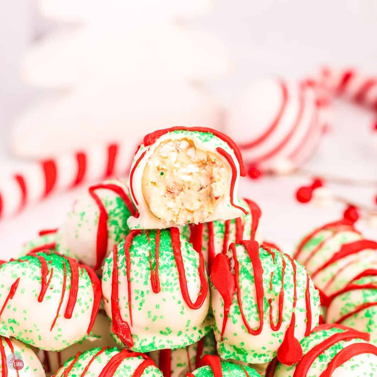 stack of cake balls with red and green decorations