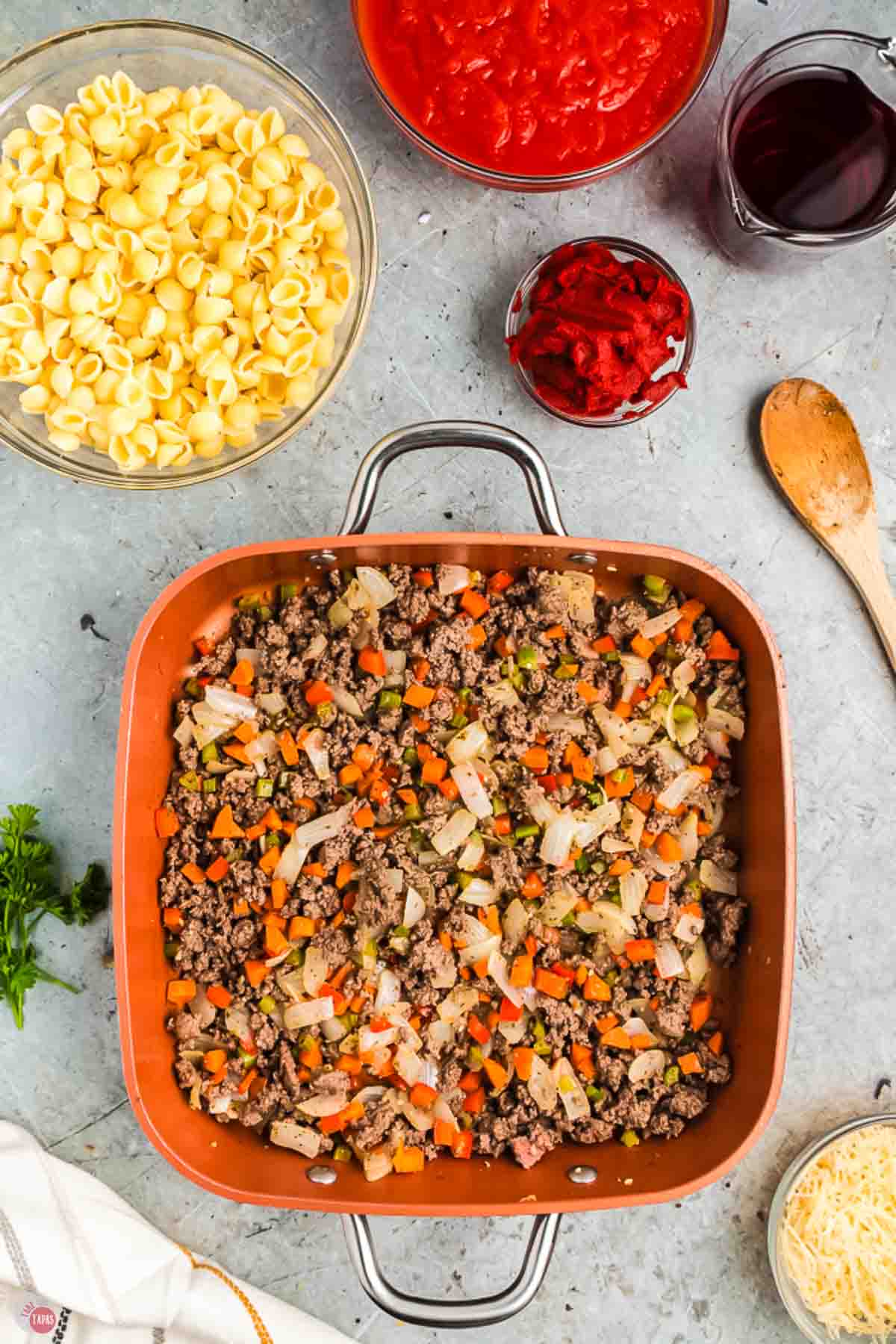 cooked ground beef and vegetables in a skillet
