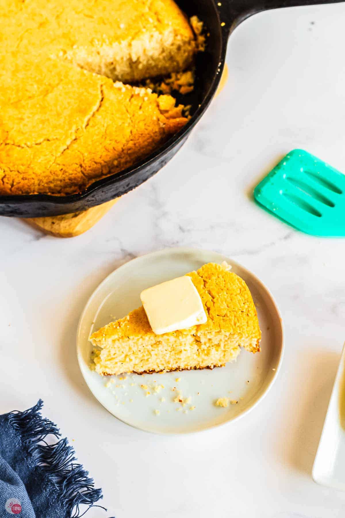 slice of southern cornbread with butter