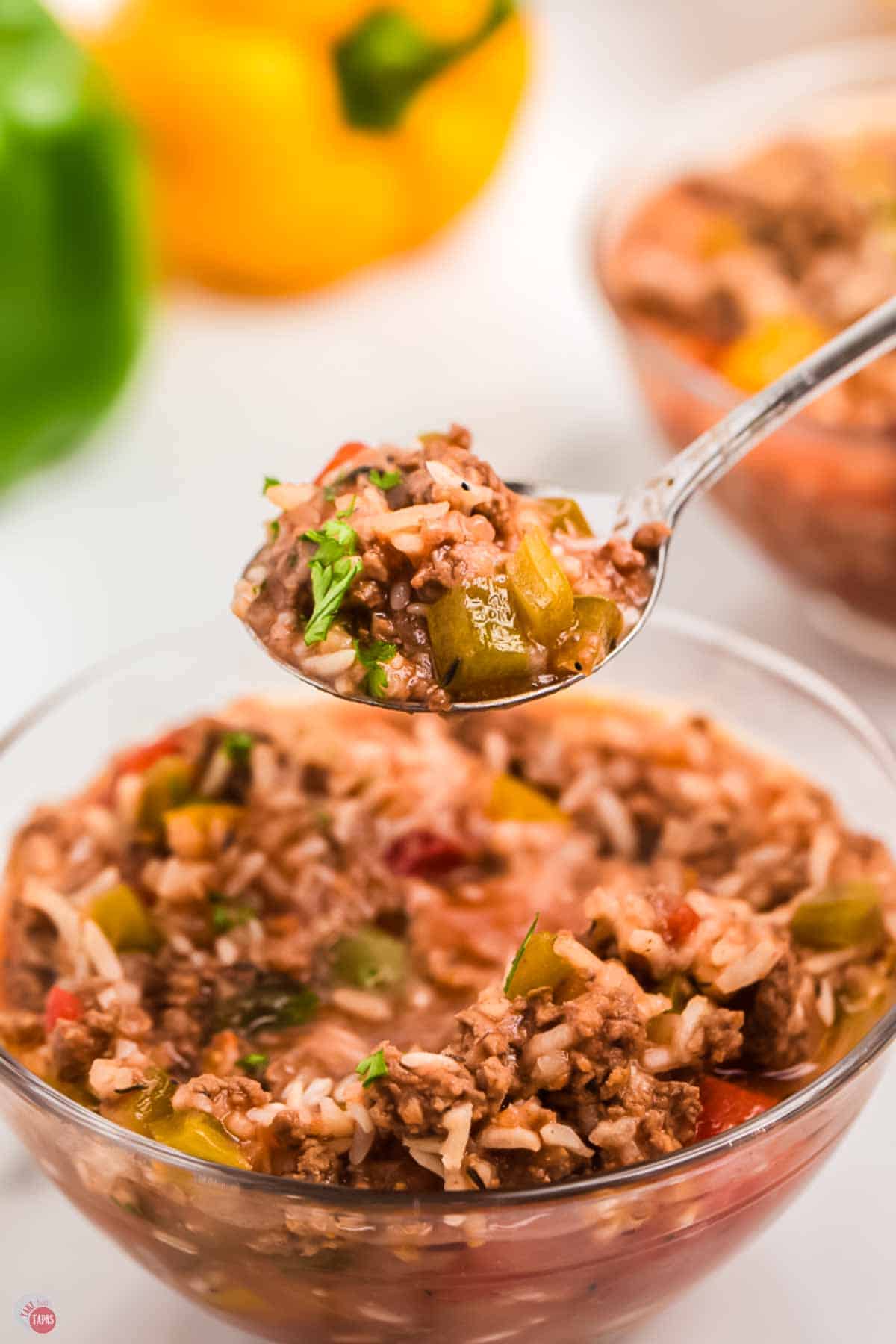 close up of spoon with soup in it