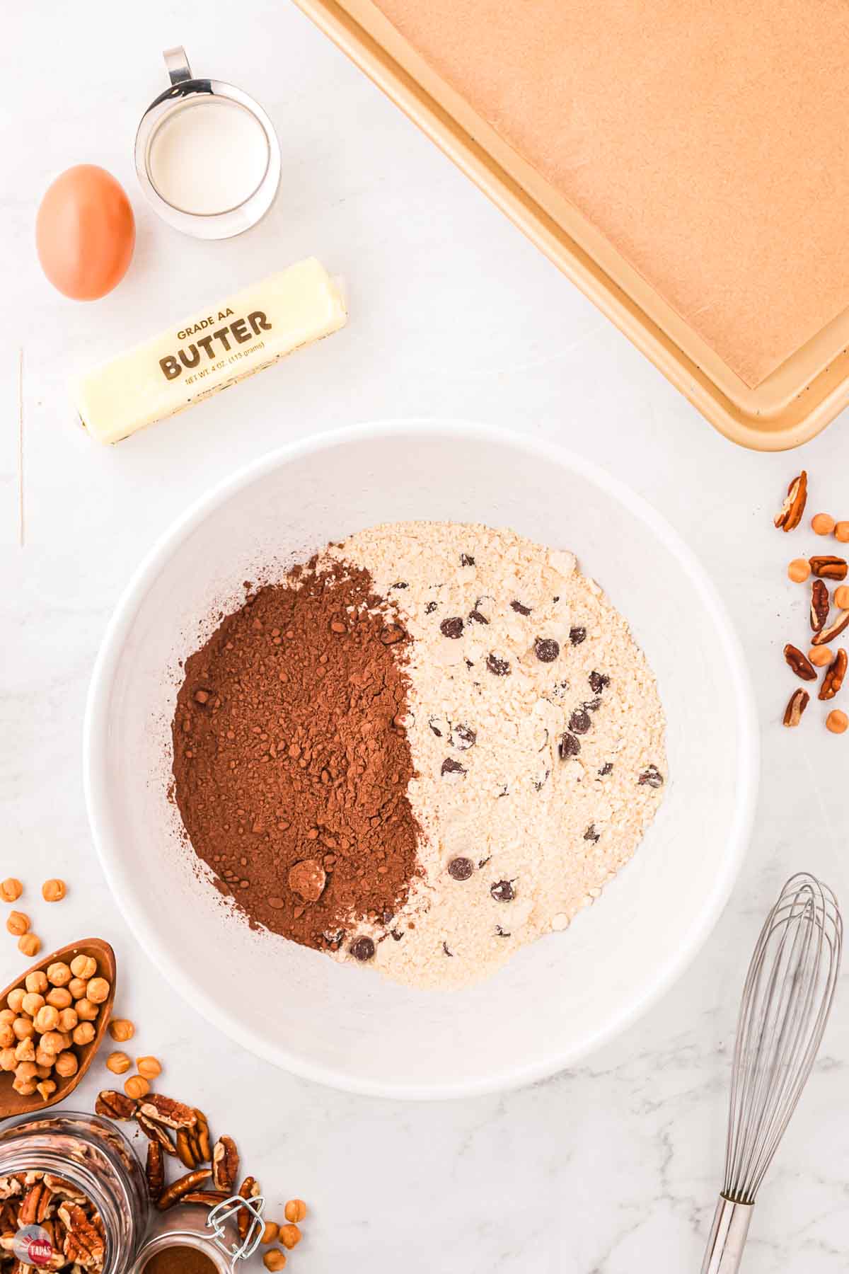 chocolate chip cake mix and cocoa powder in a white bowl