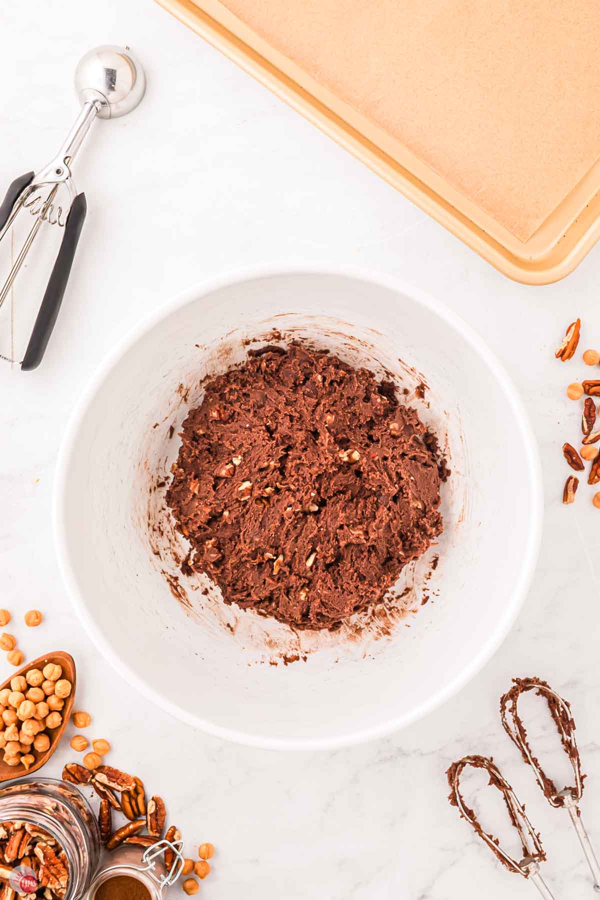 chocolate chip cookie dough in a white bowl