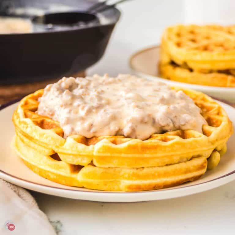 stack of waffles topped with gravy