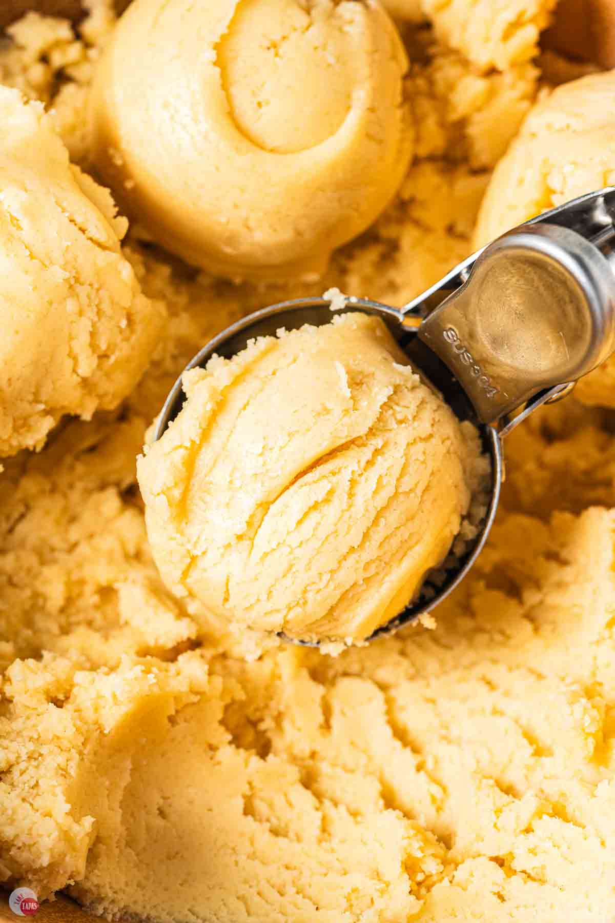 ice cream scoop with raw cookie dough in it