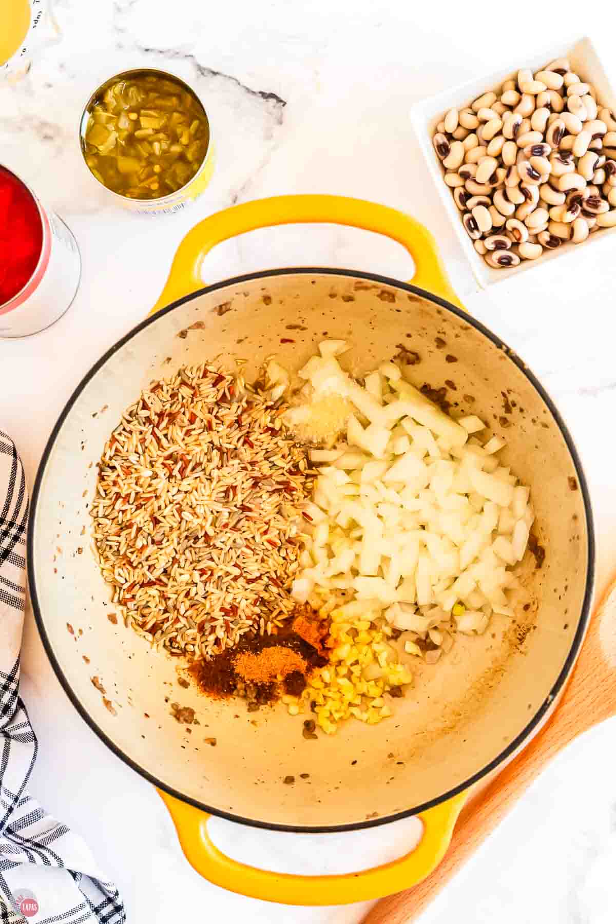 rice and onion cooking in a pot
