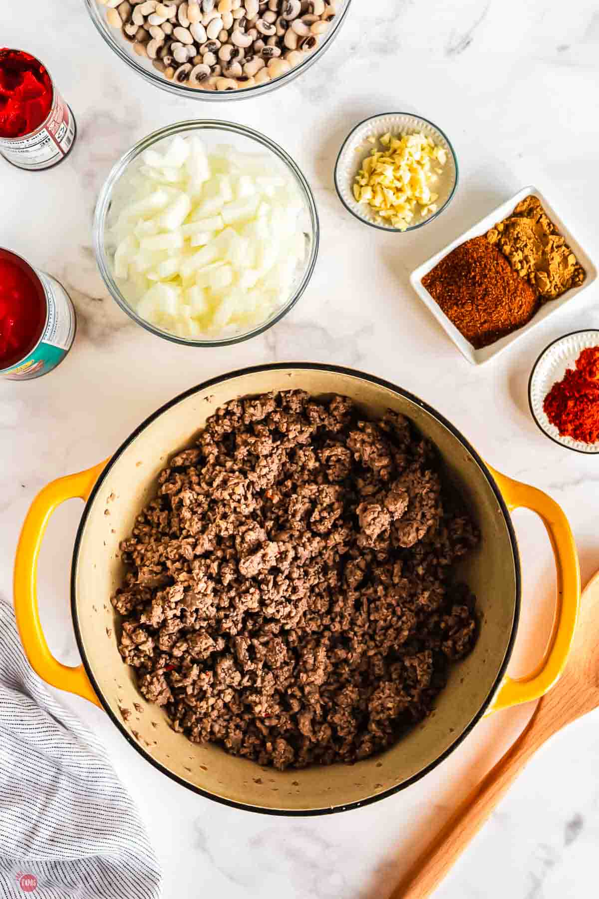 cooked ground beef in a yellow pot