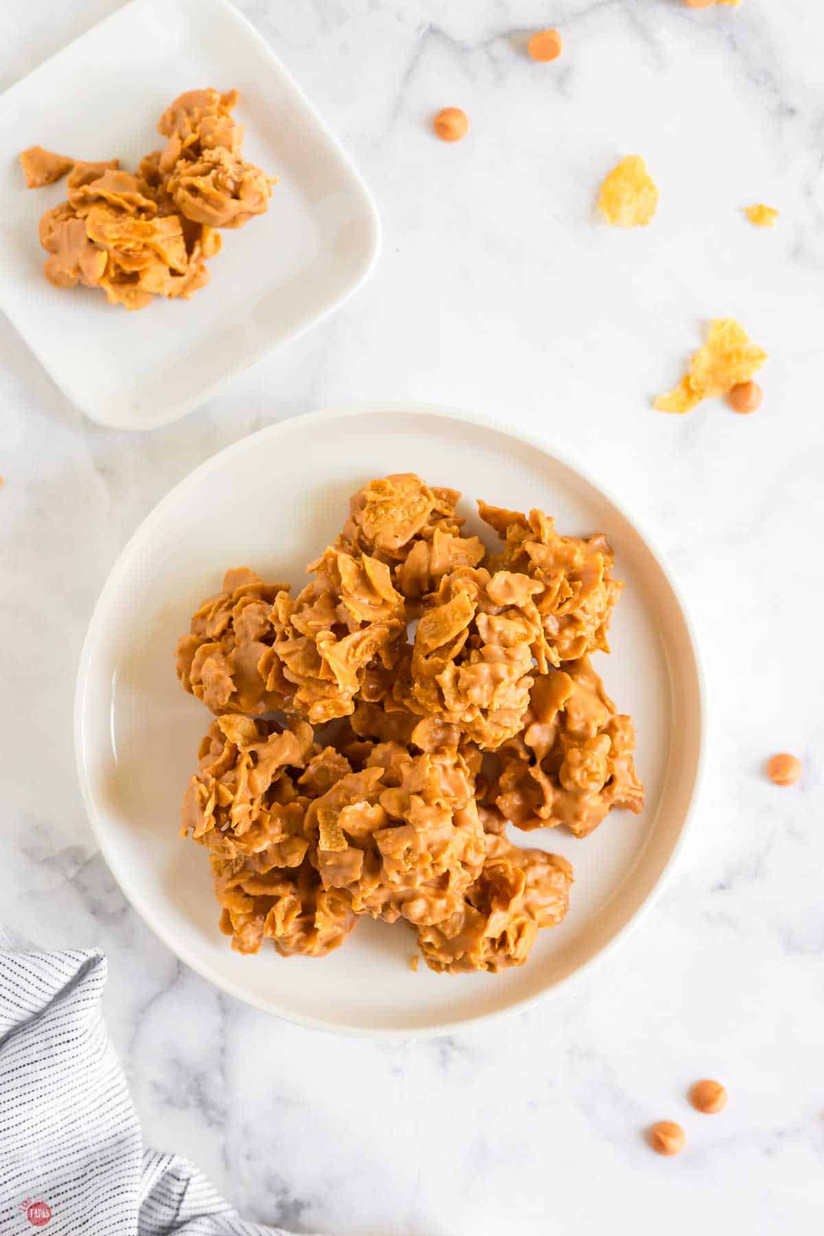 overhead of white plate topped with no bae cookies
