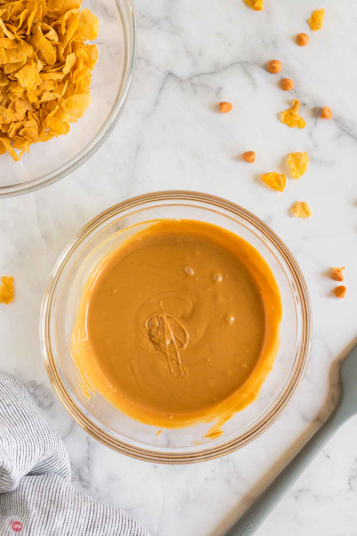 melted peanut butter mixture in a clear bowl