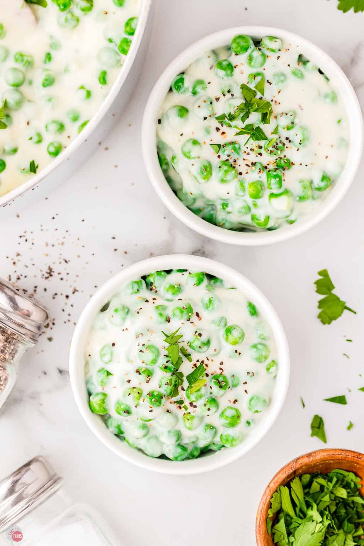 two bowls of creamed peas 