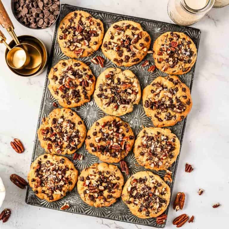 metal serving tray with 12 cookies on it
