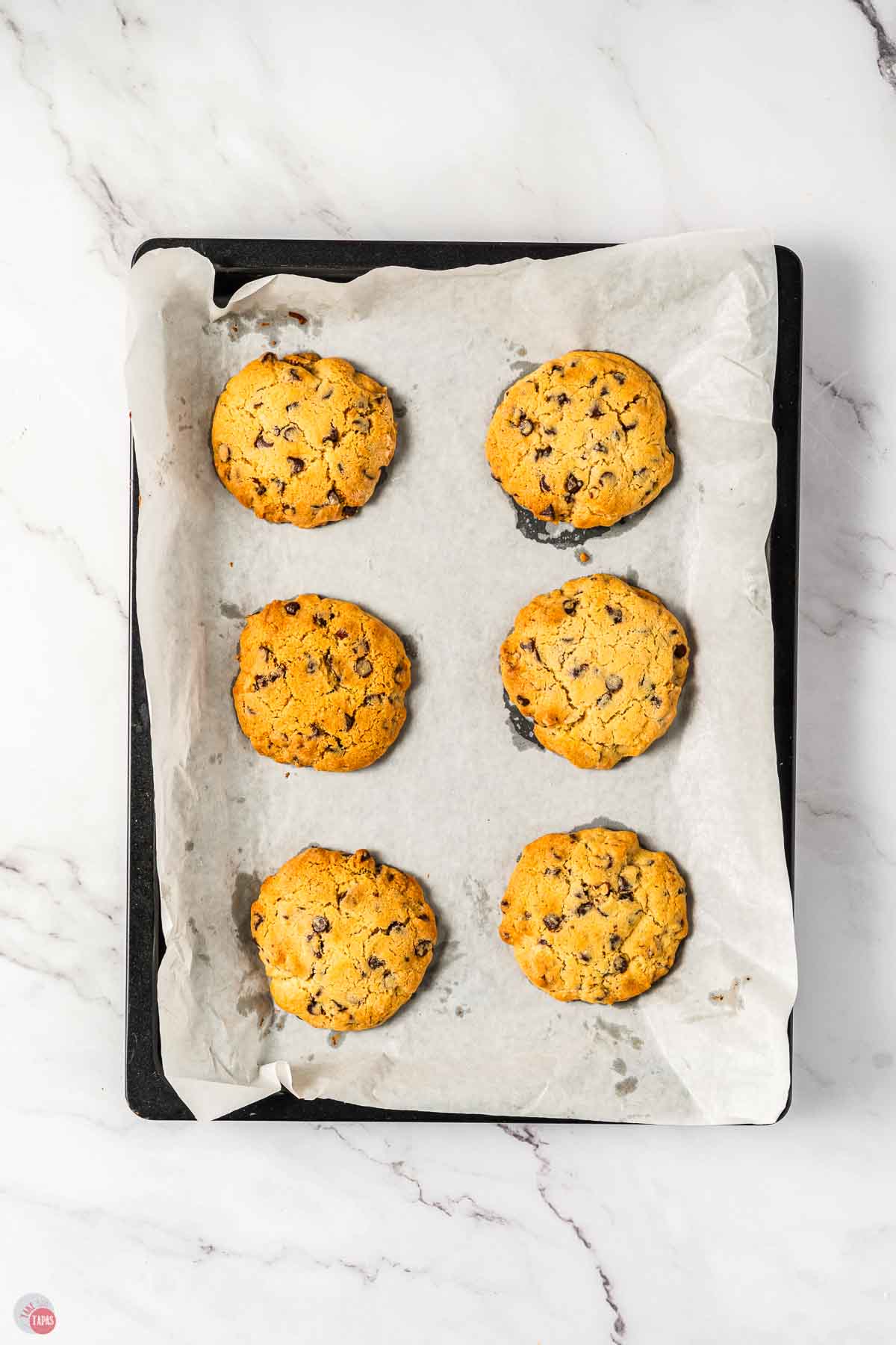 baked cookies on a piece of parchment paper