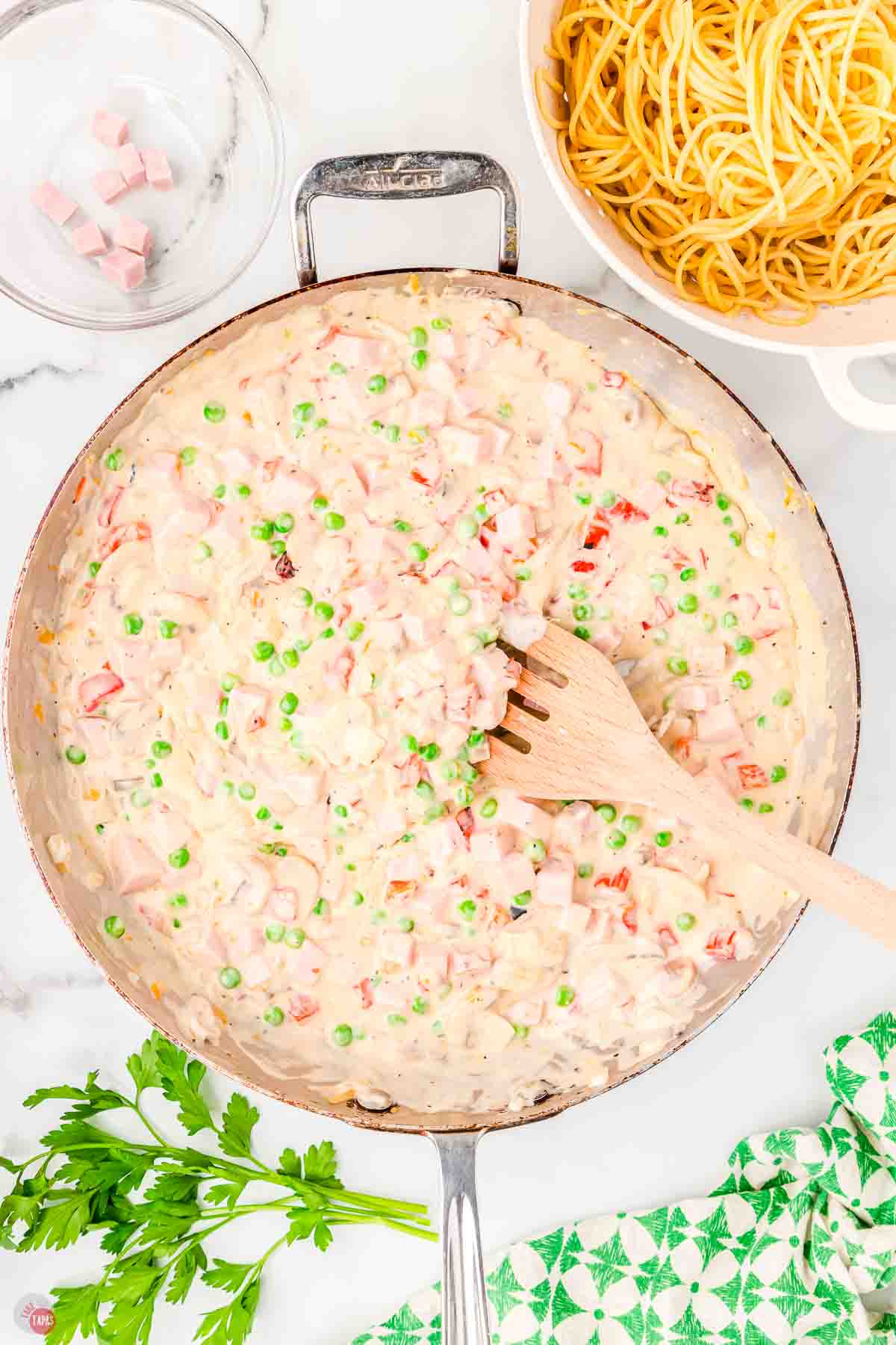 skillet with ham and cream sauce