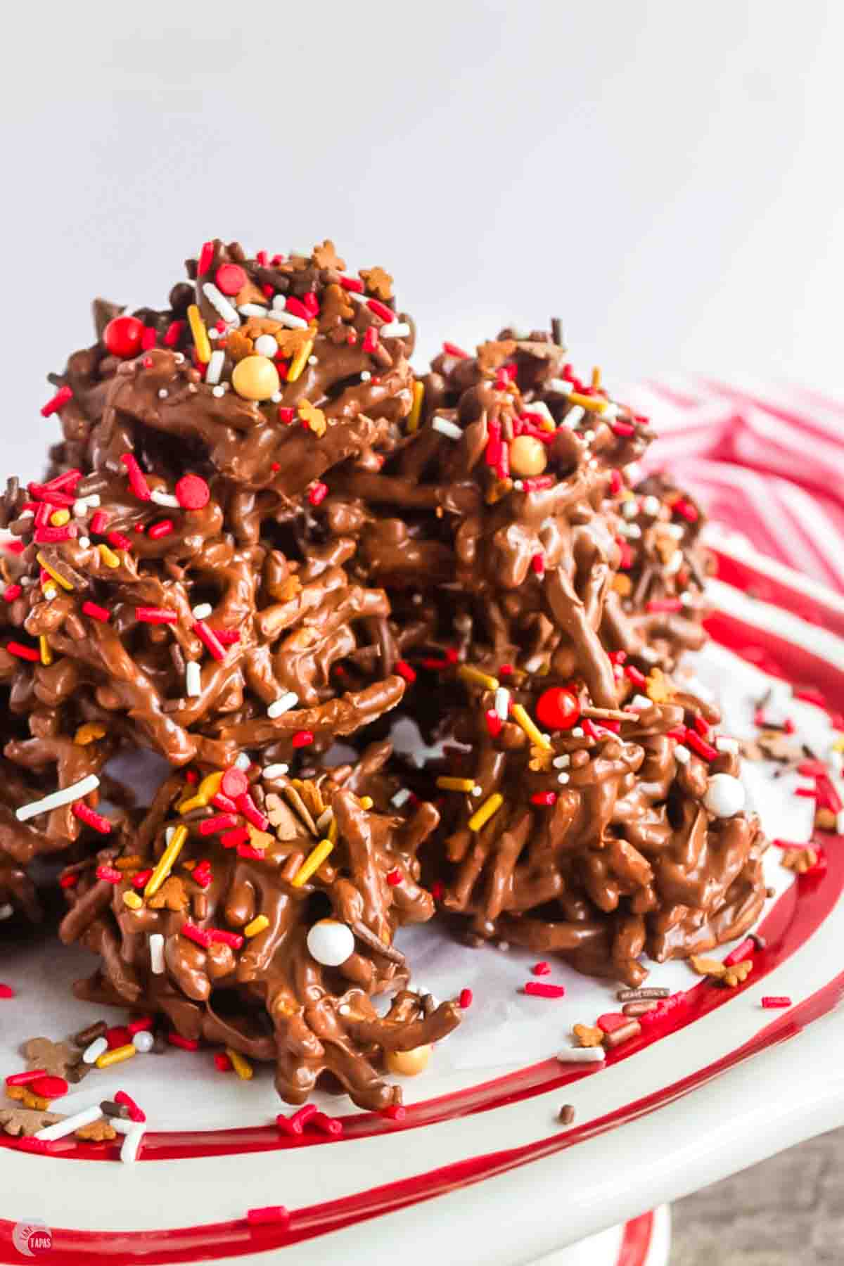 haystack cookies on a candy cane striped plate