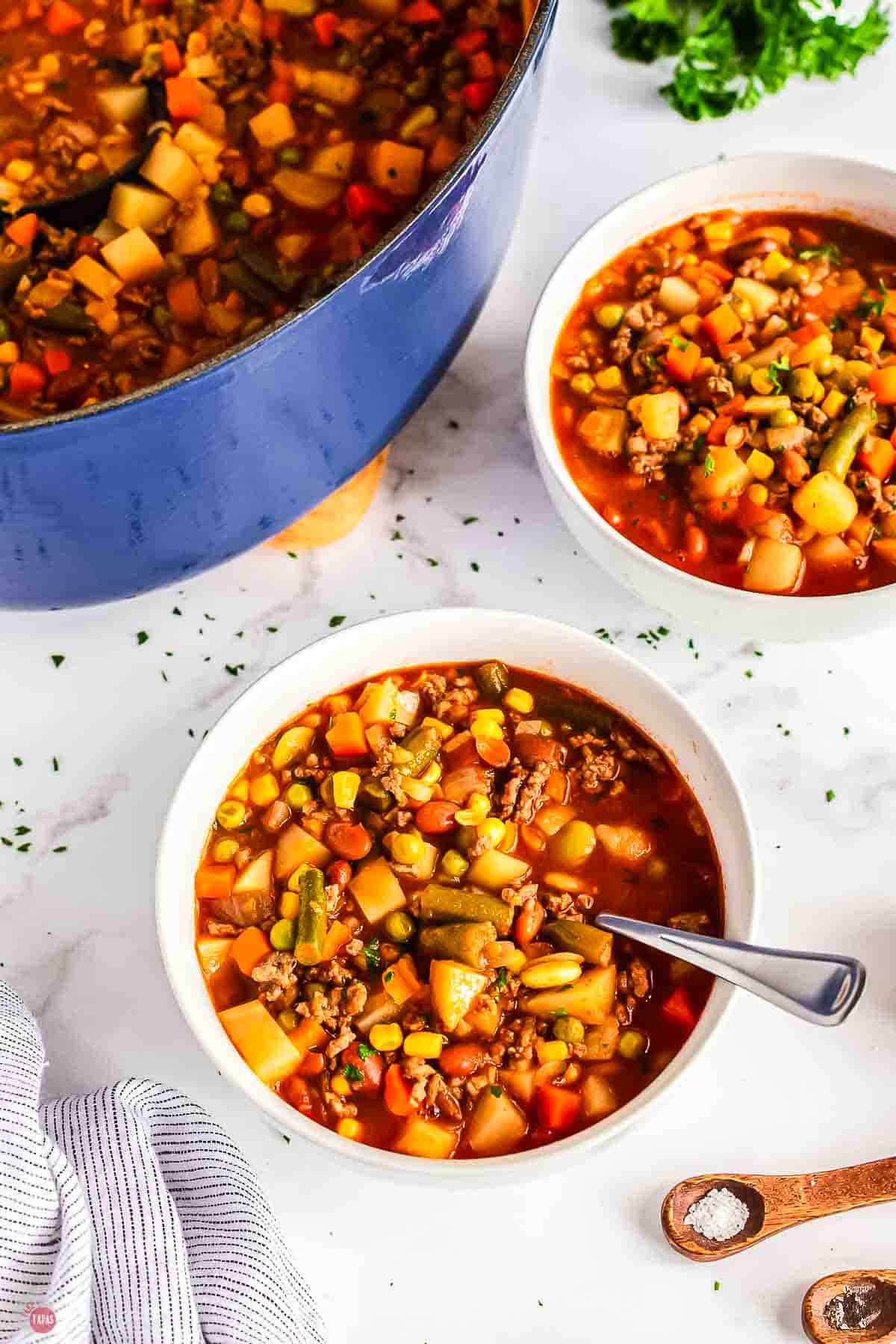 bowl of soup with a spoon in it