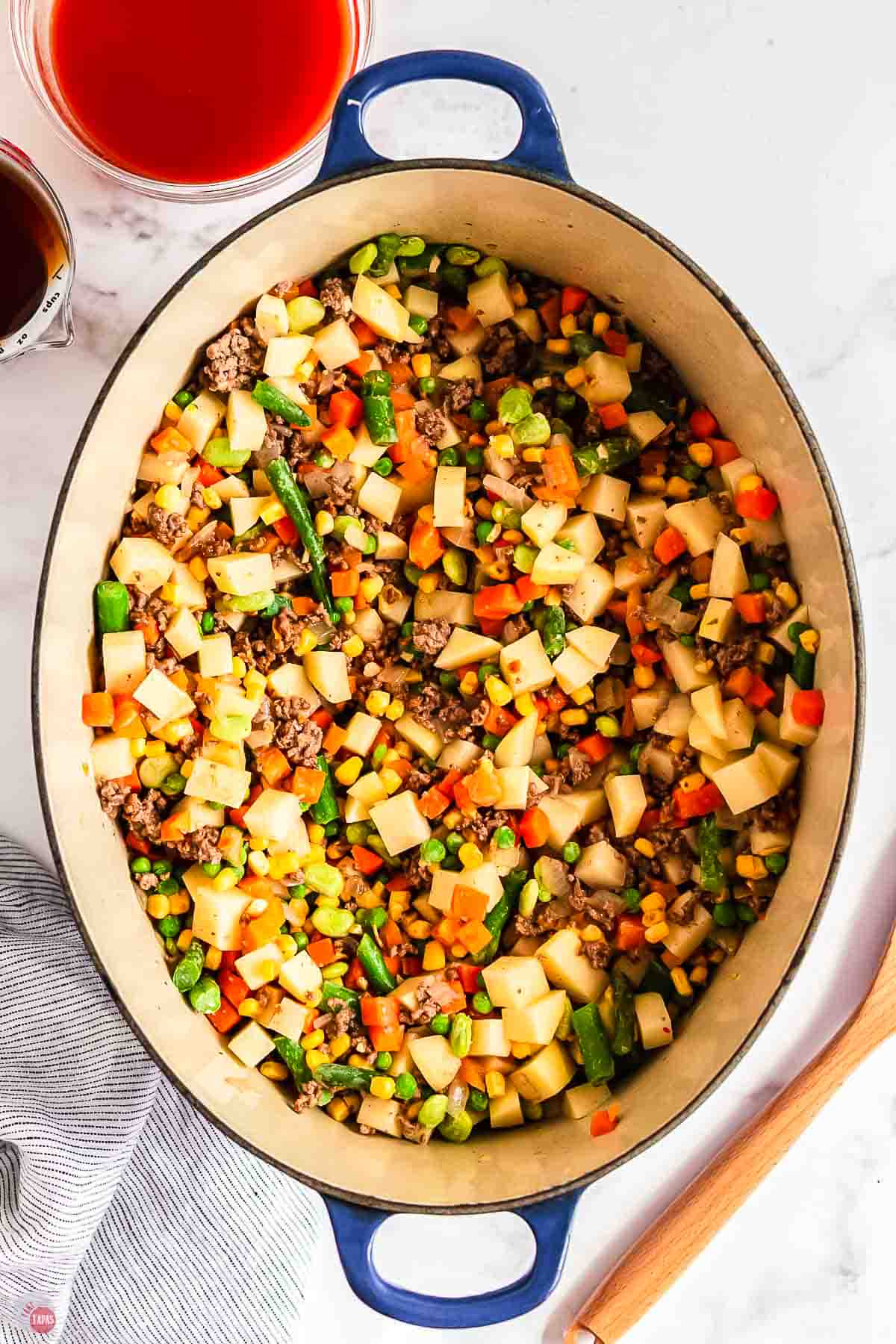 potatoes and mixed vegetables in a large pot