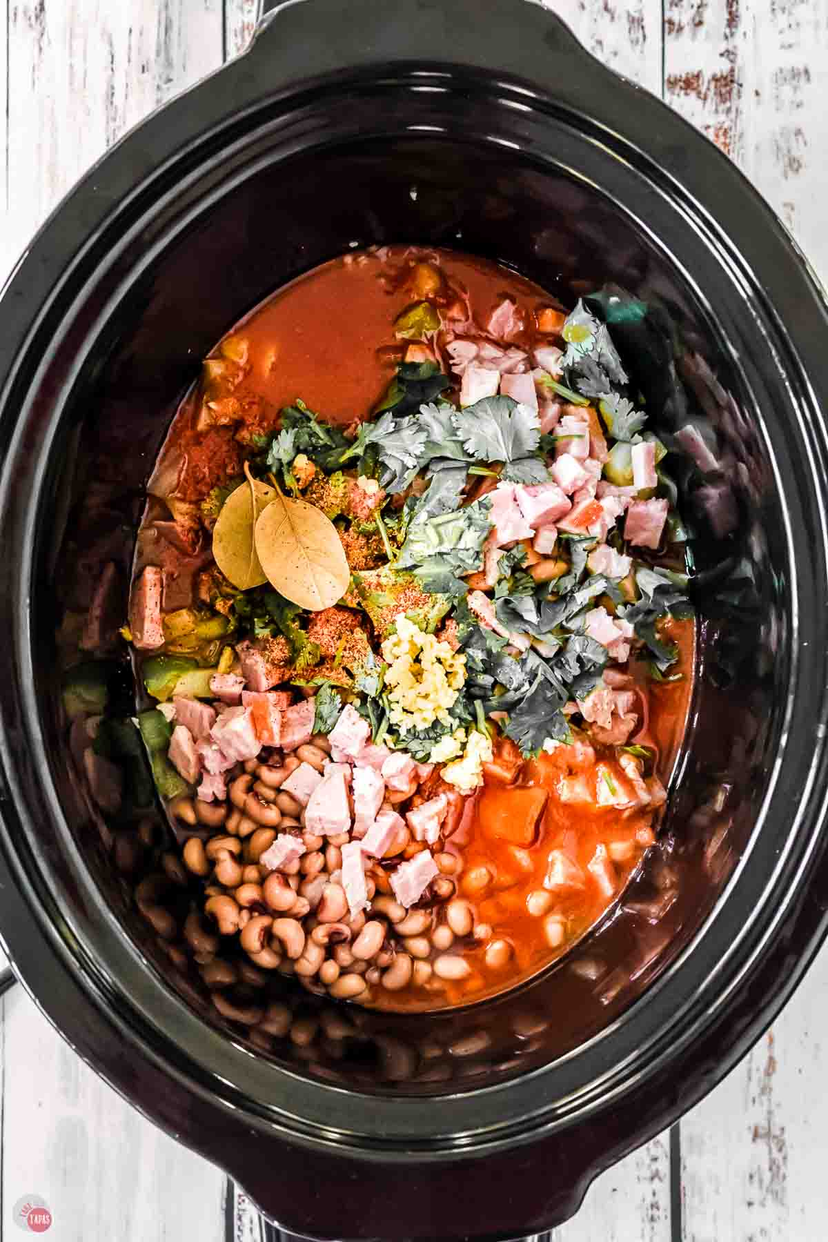 unmixed ingredients in a crock pot