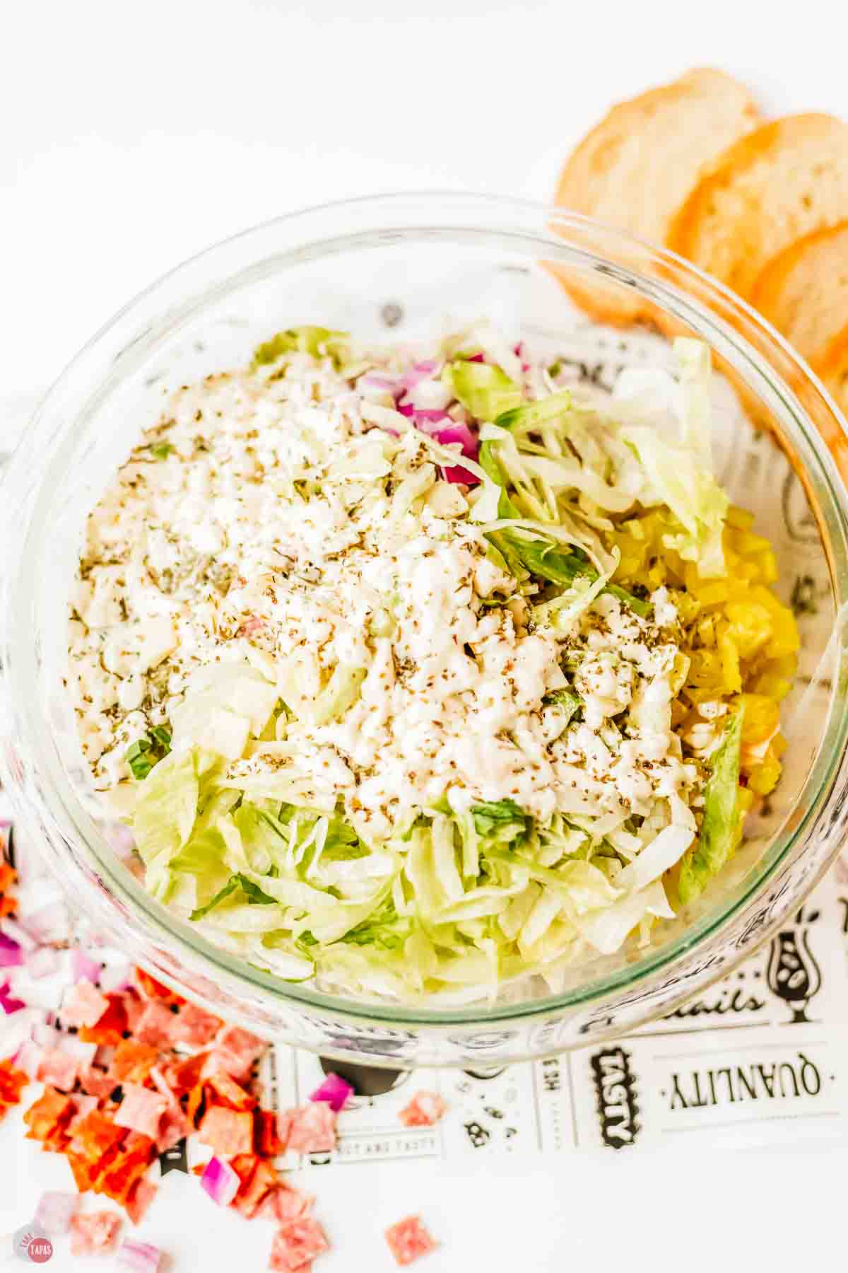 creamy dressing on top of a salad