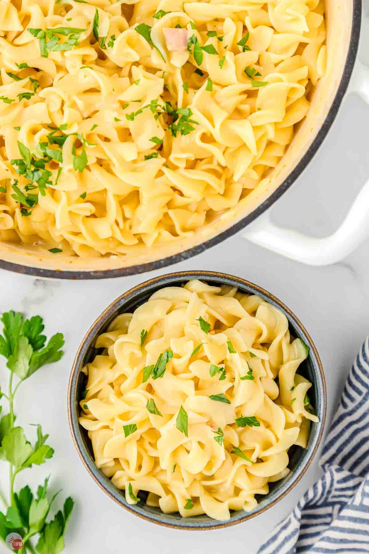 bowl and pot of cafeteria noodles