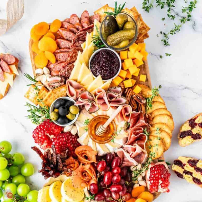 a simple charcuterie board with meats and cheeses