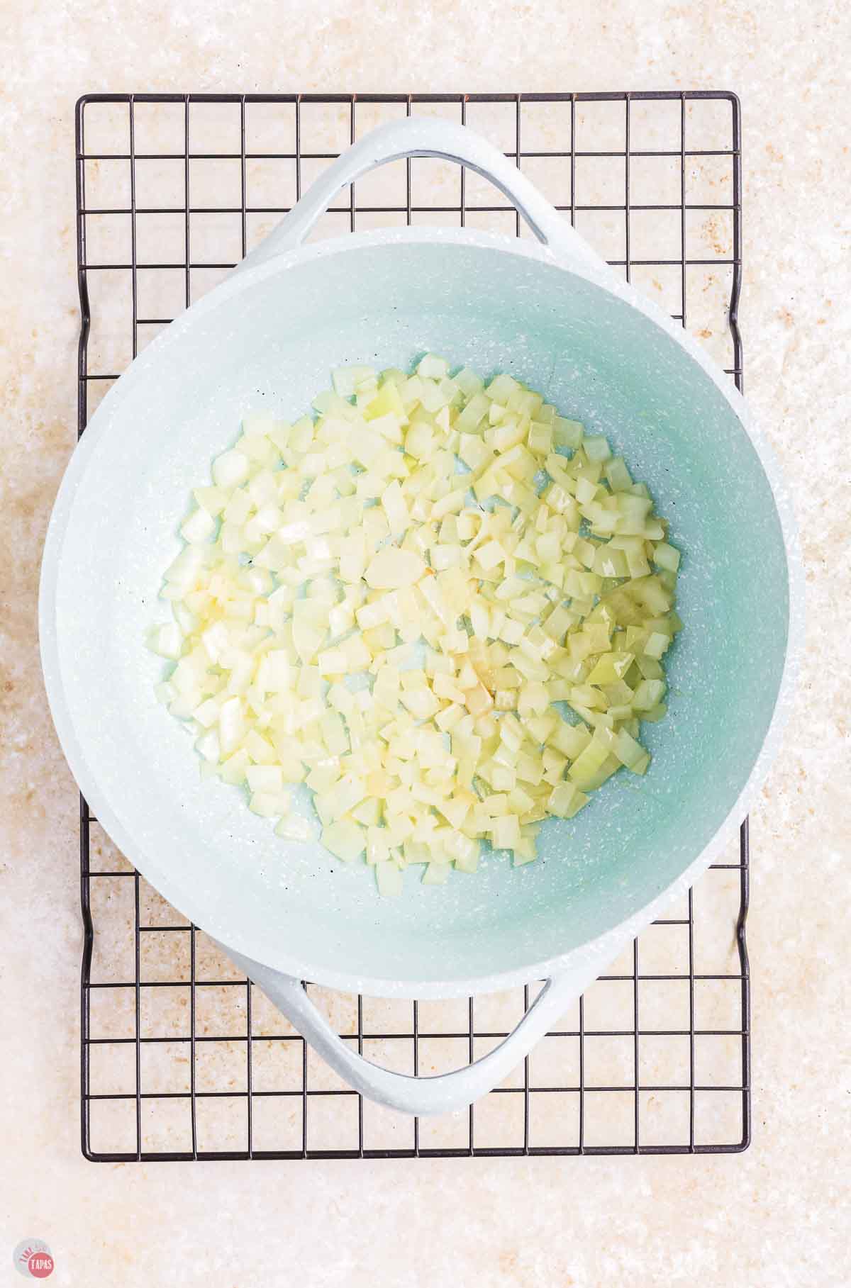 diced onion in a skillet