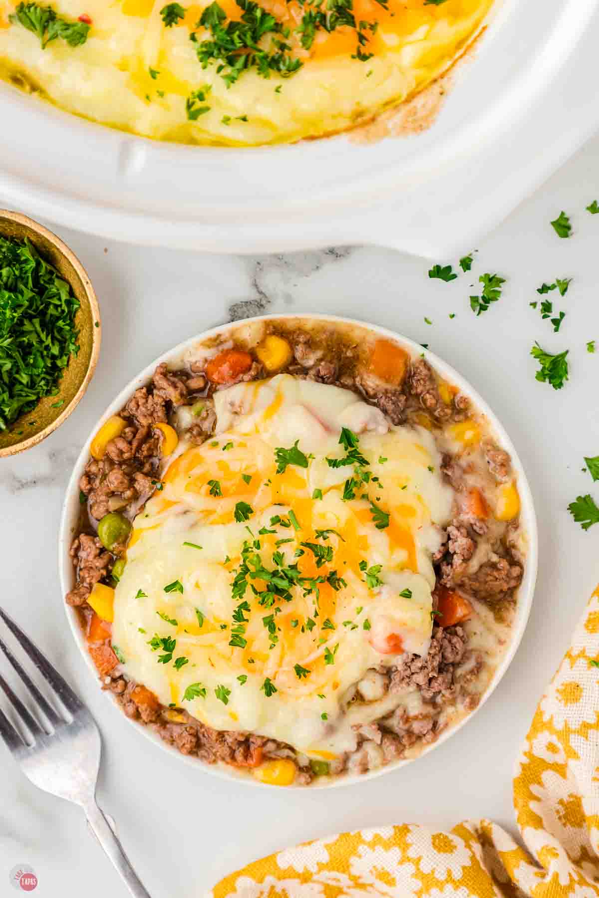 bowl of shepherds pie with parsley sprinkled on top