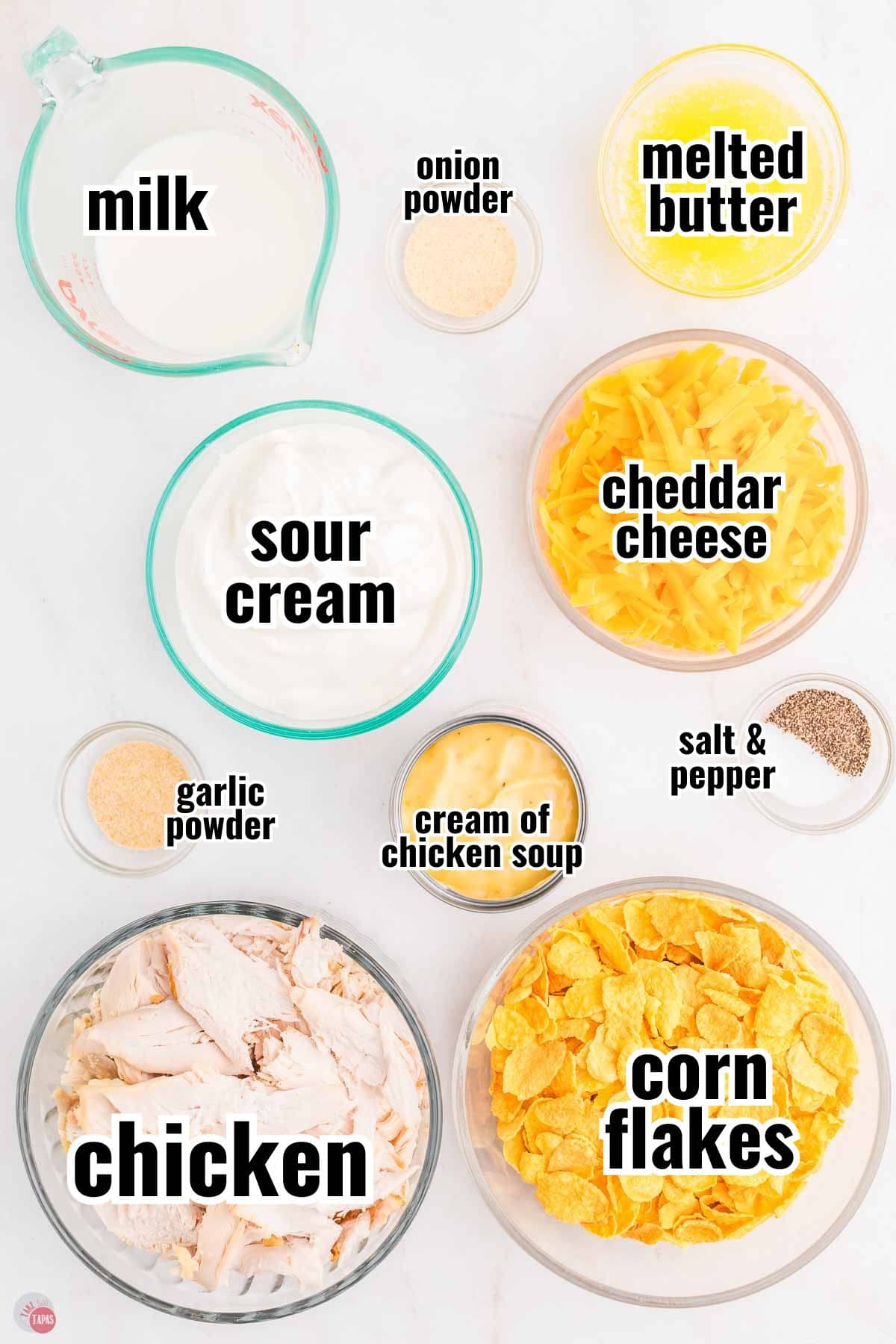 ingredients for a chicken casserole recipe in individual bowls with text overlay labeling them