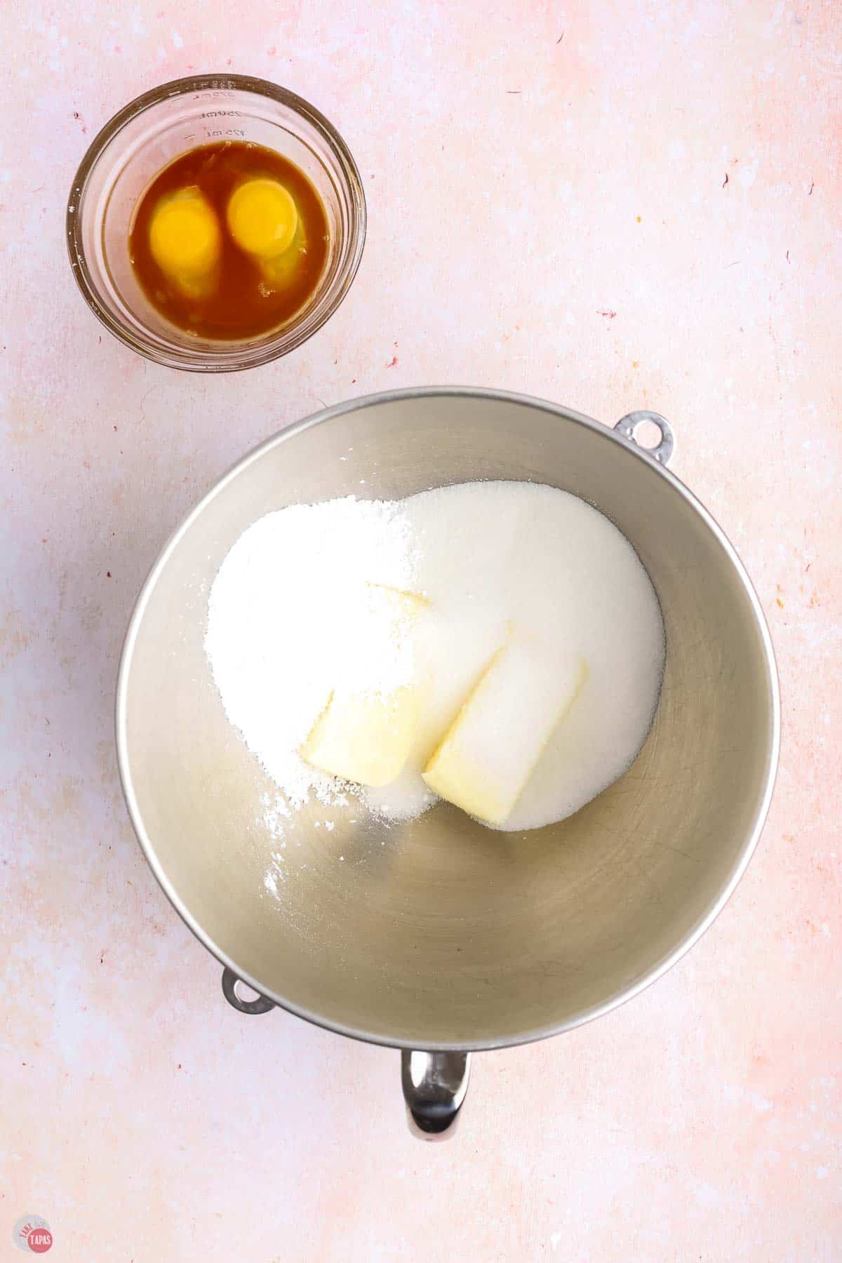 butter and sugar in a metal mixing bowl