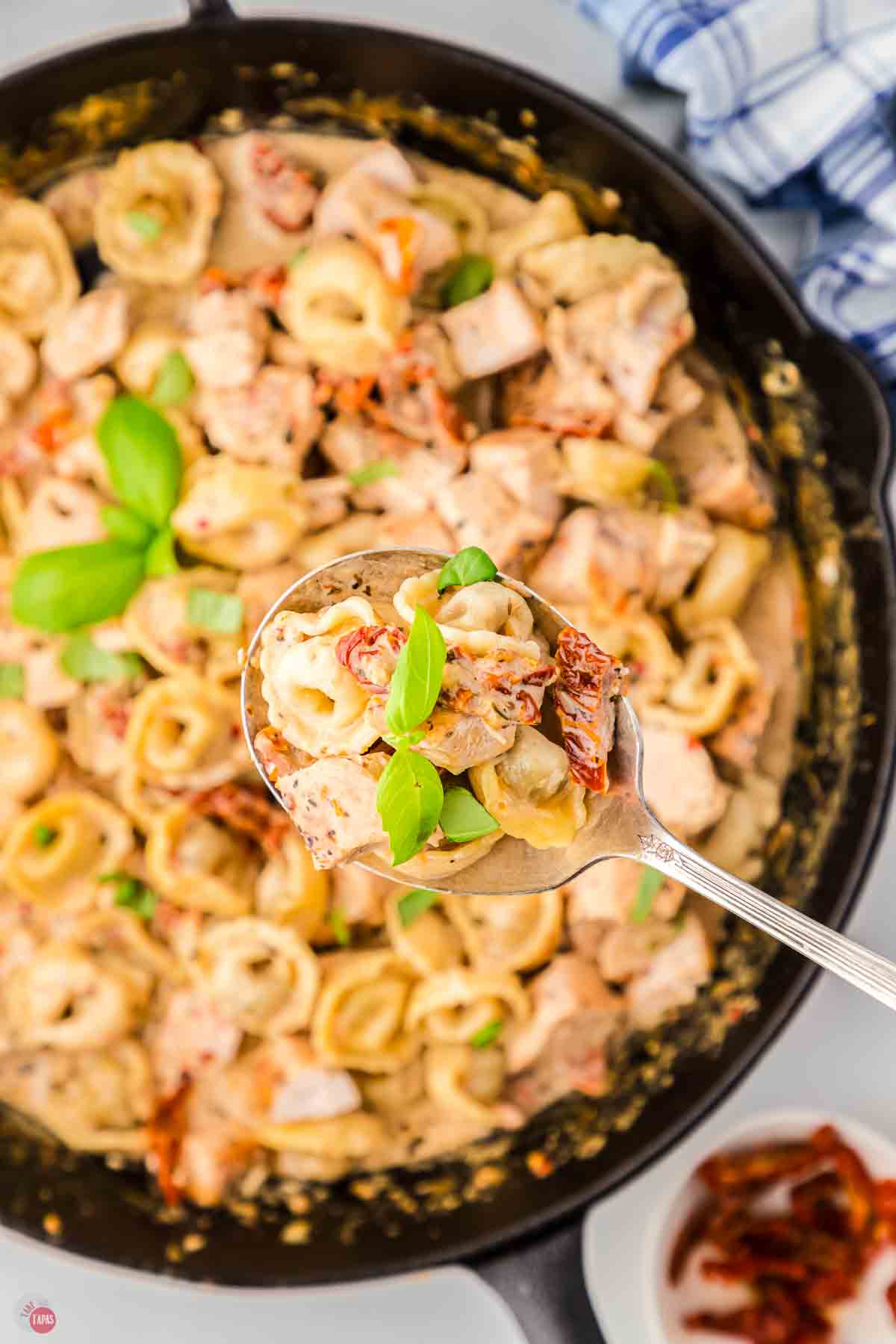 close up of chicken recipe in a black skillet