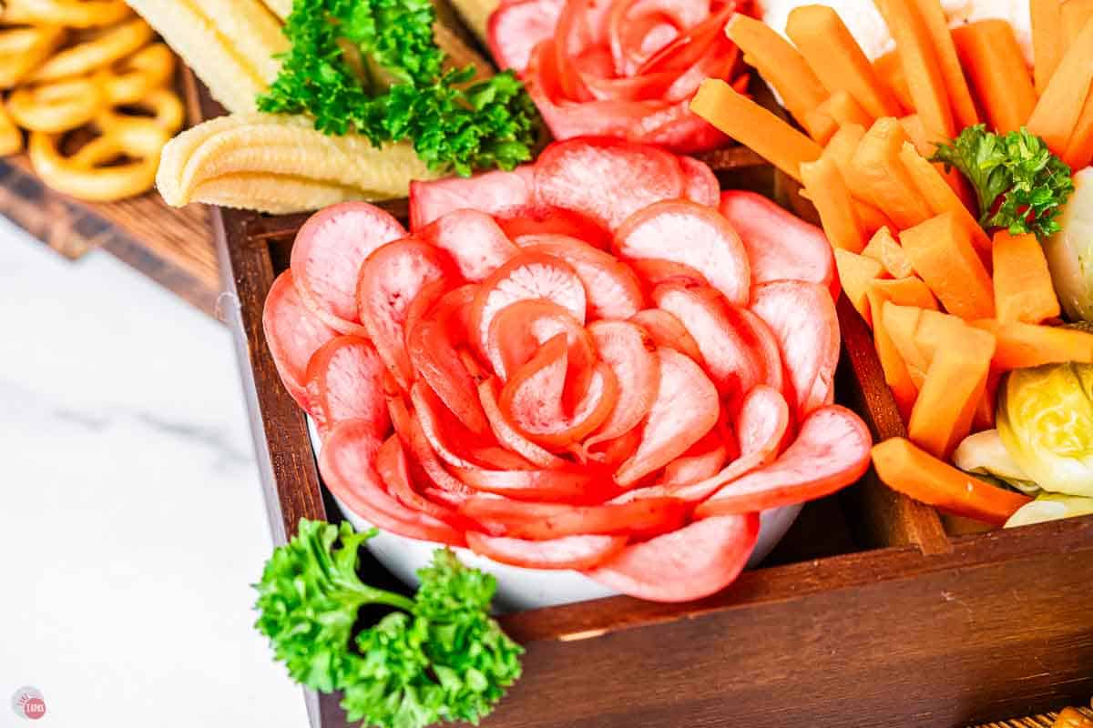 radish flower in a wood box