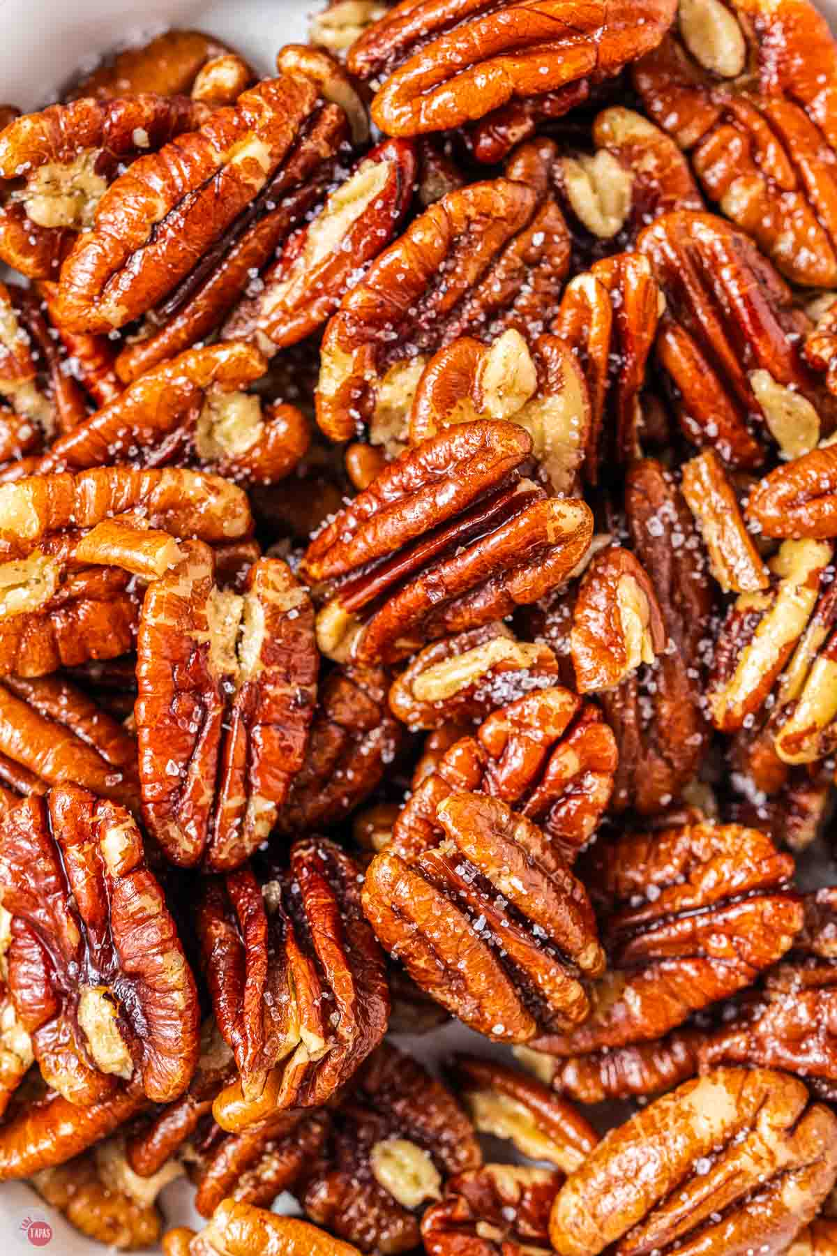 close up of toasted pecan halves