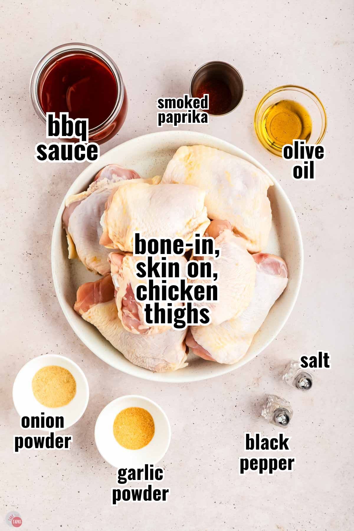 ingredients for a chicken recipe in individual bowls with text overlay labeling them