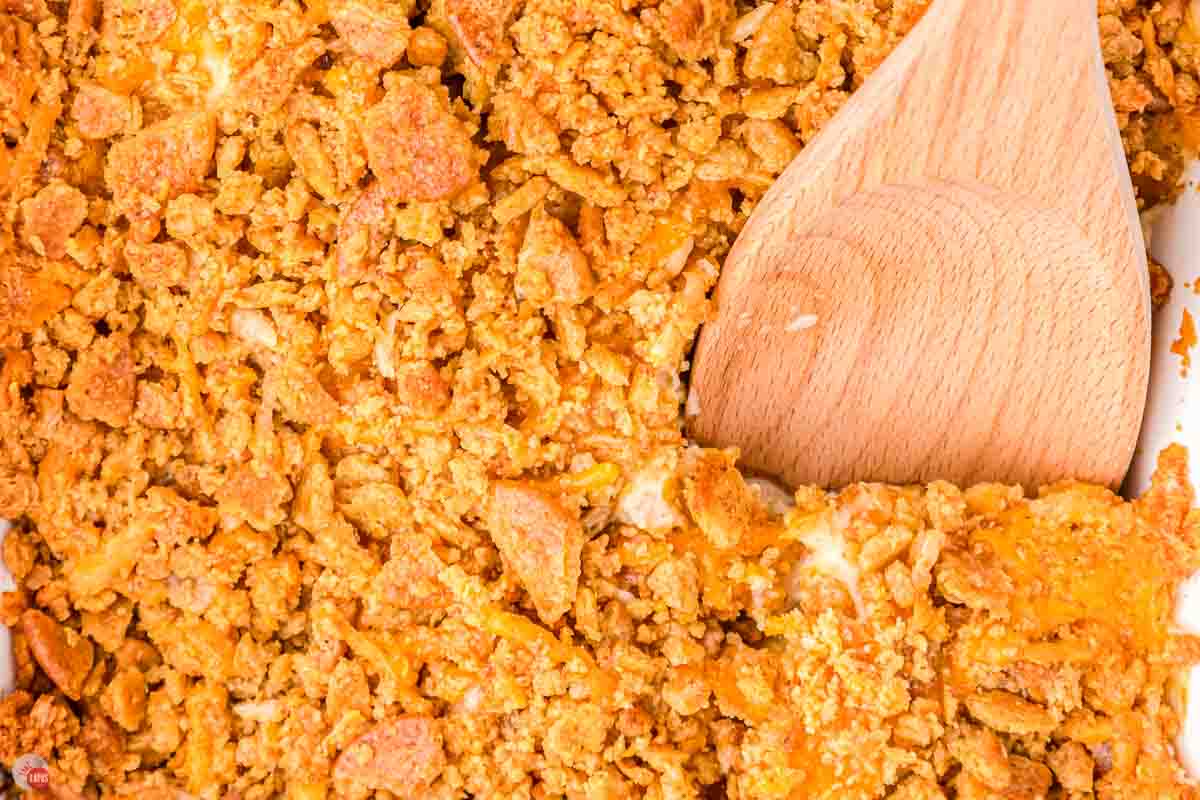 casserole with a wood spoon being stuck in it