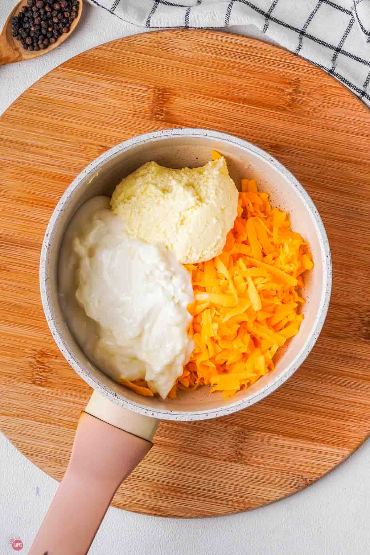 small bowl of cheese, sour cream, and cream cheese