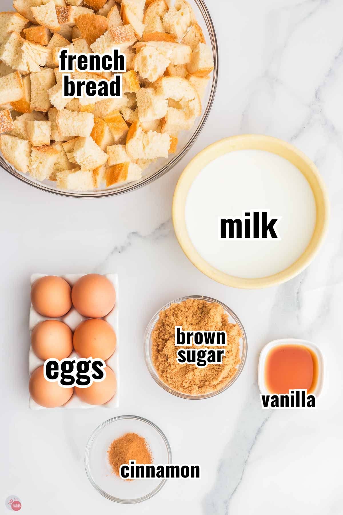 ingredients for a breakfast casserole recipe with text overlay labeling them