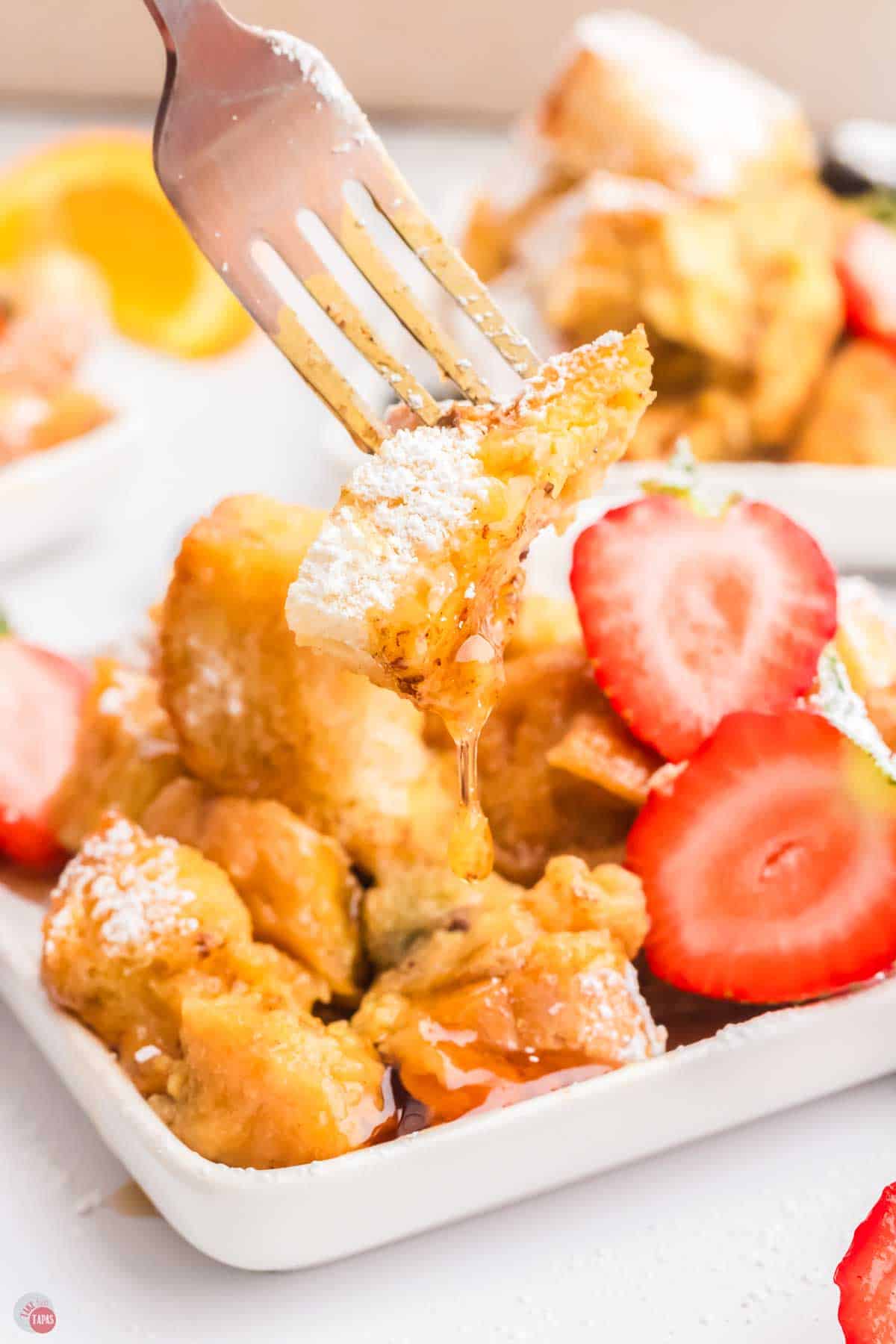 fork with a bite of bread on it