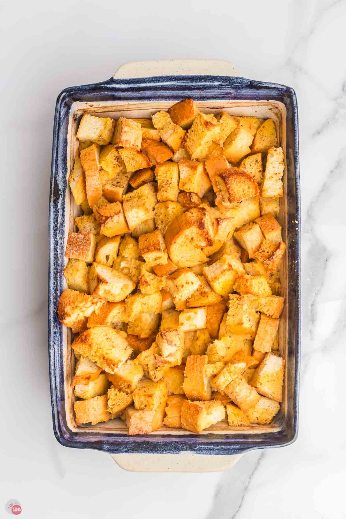 baked french toast in a blue casserole