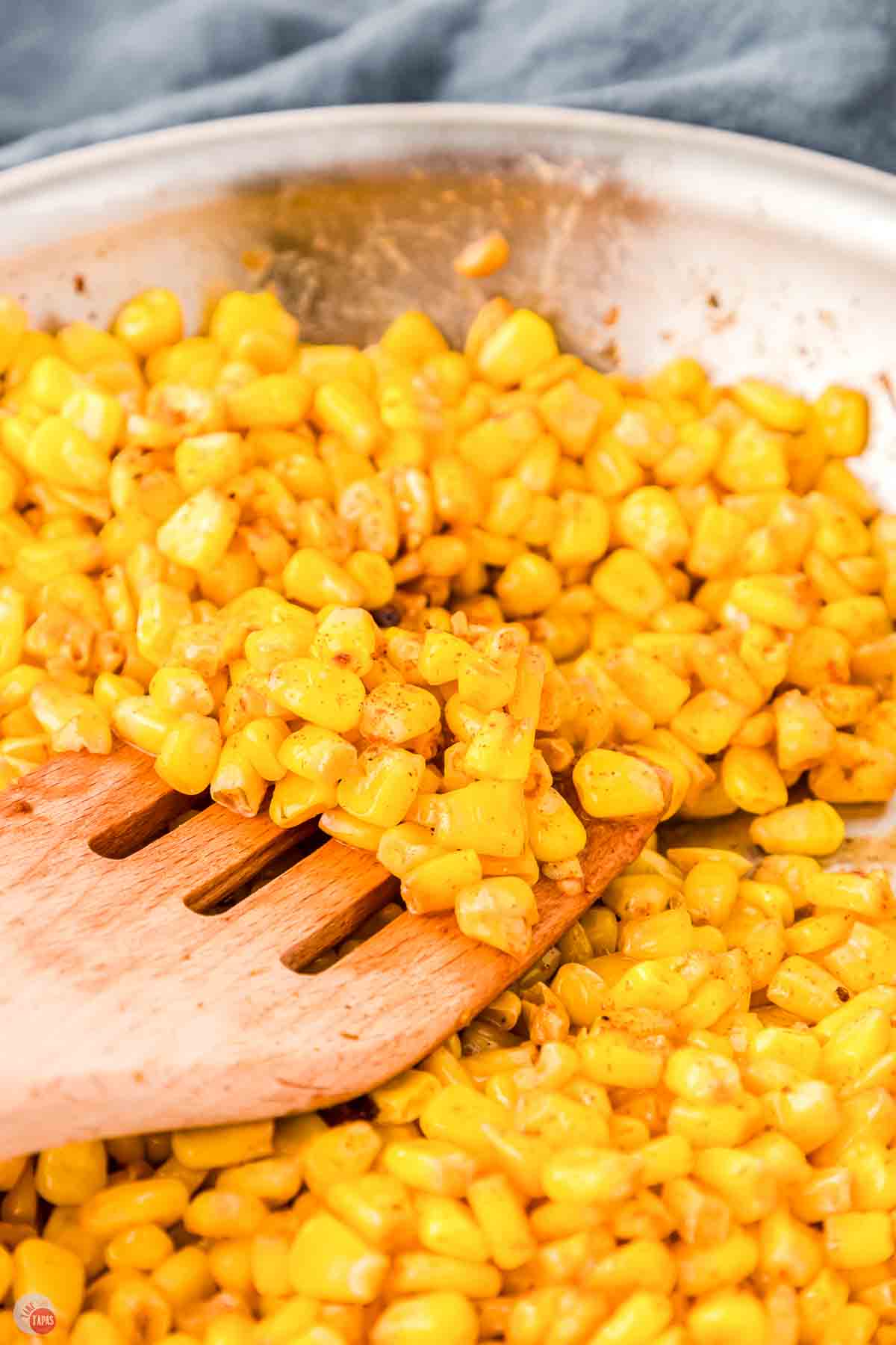corn with a wood fork