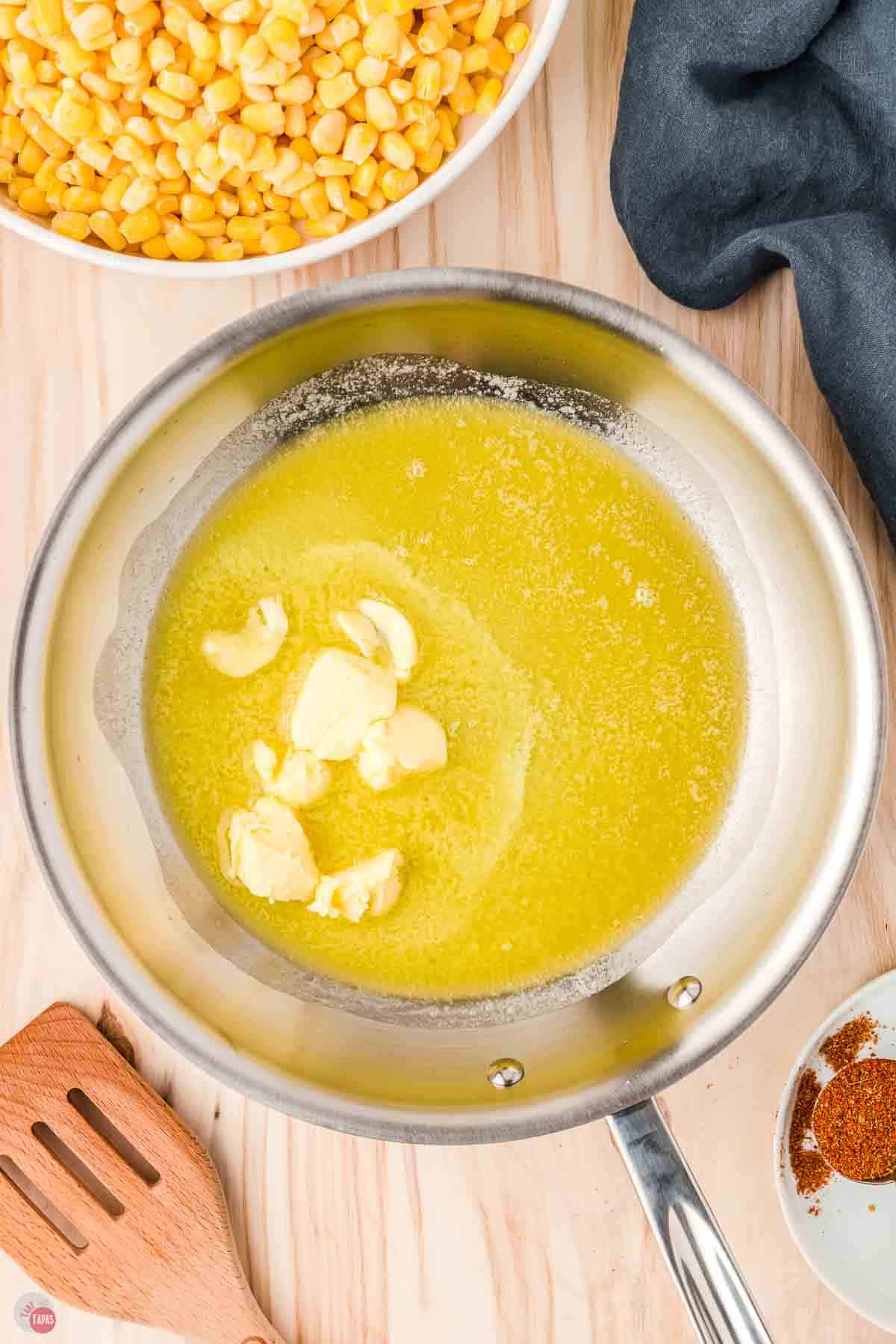 melted butter in a silver skillet