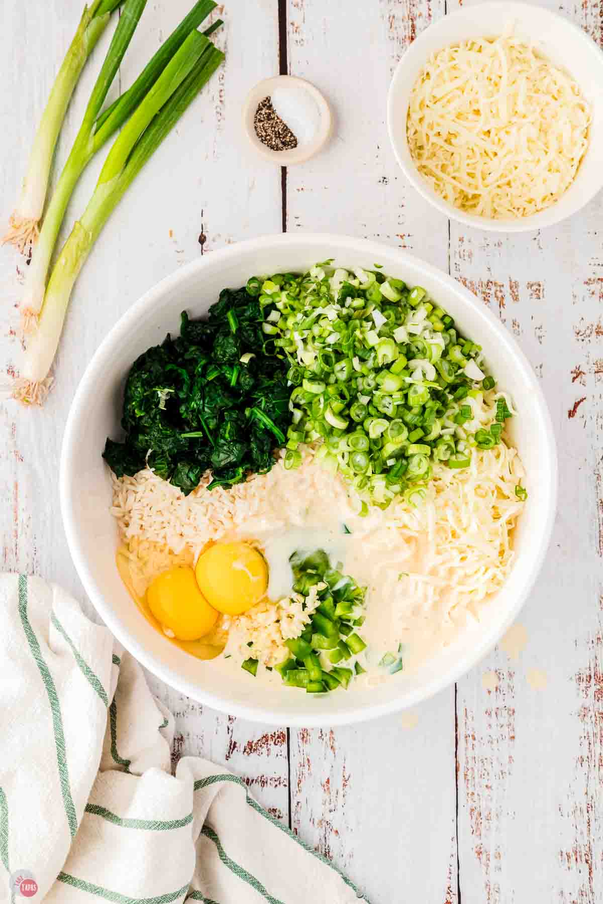 unmixed ingredients for a casserole in a large bowl