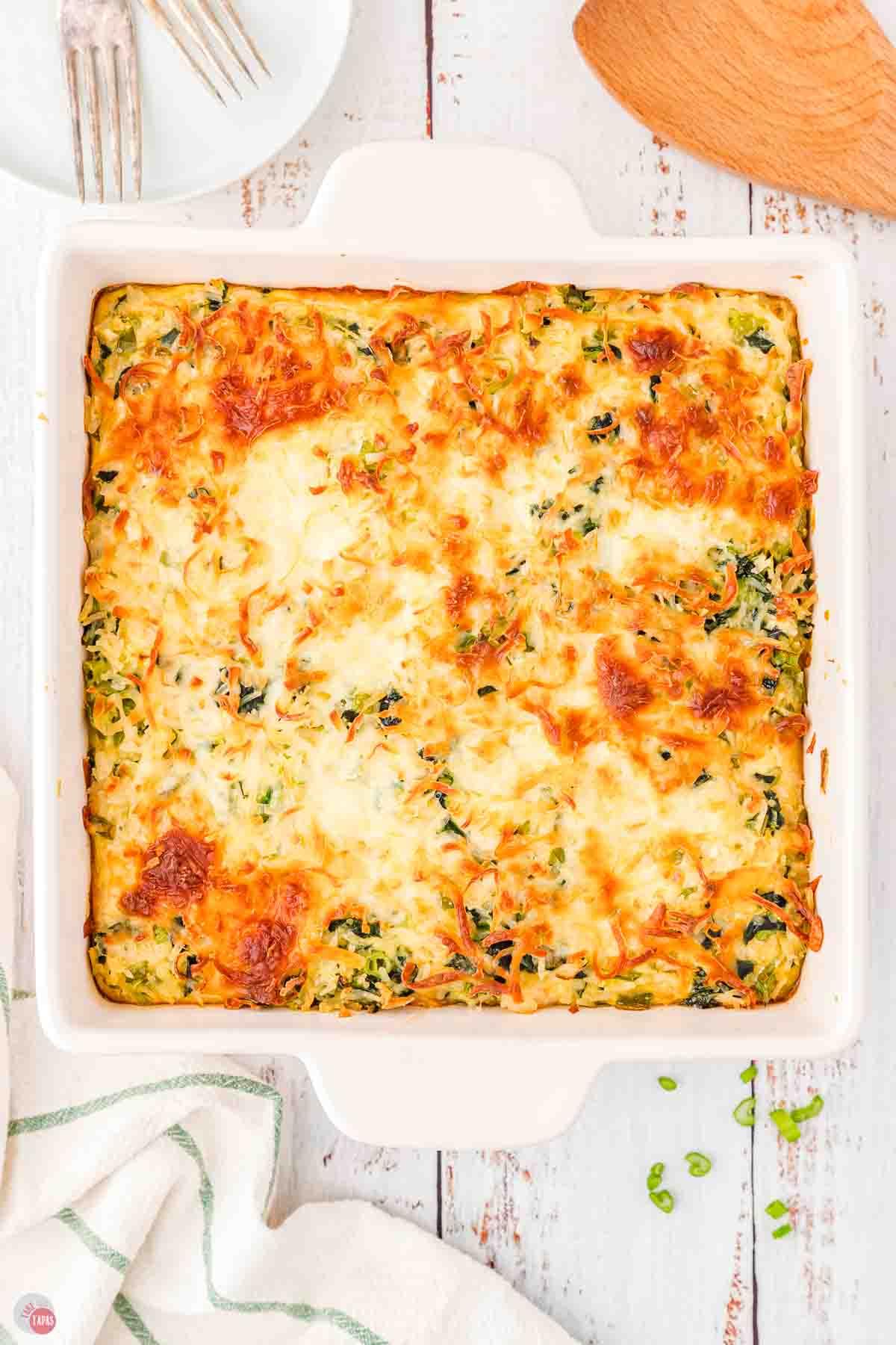 baked rice casserole in a square white dish