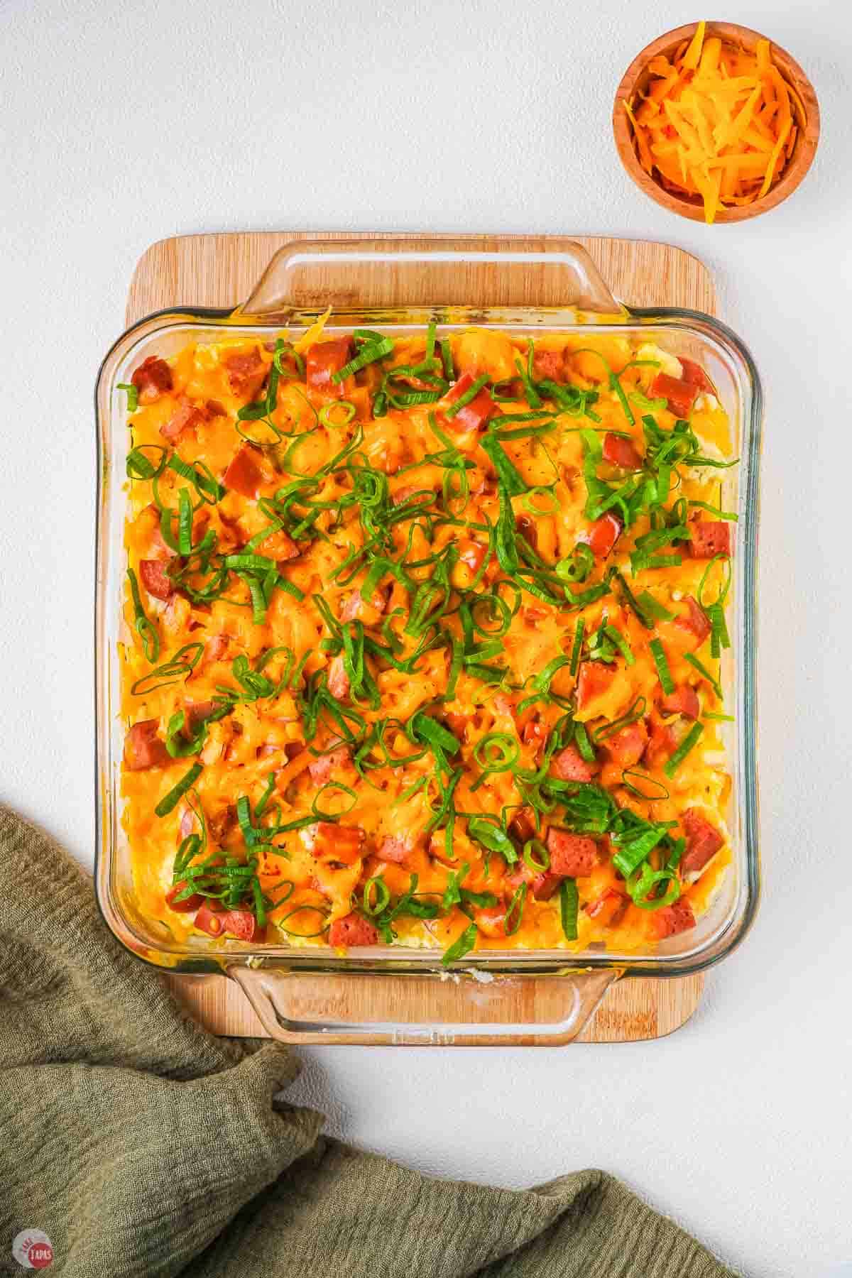 baked casserole on a wood board