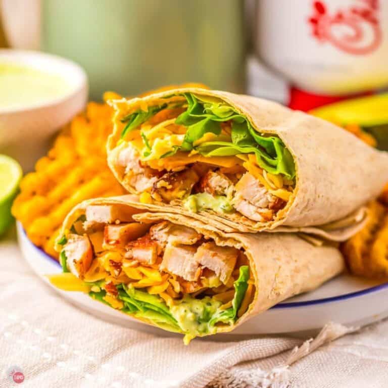 copycat Chick Fil A Cool Wrap on a plate with waffle fries