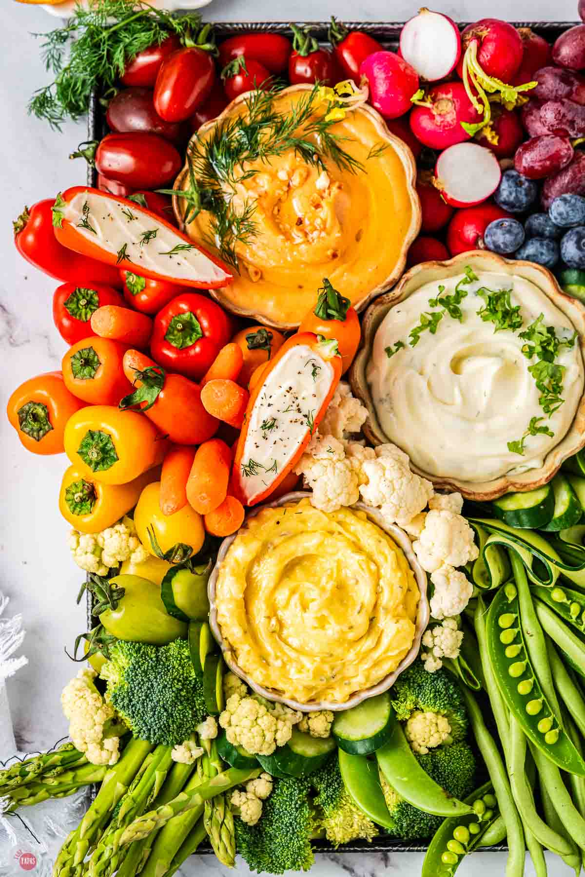 stuffed peppers and bowls of dips