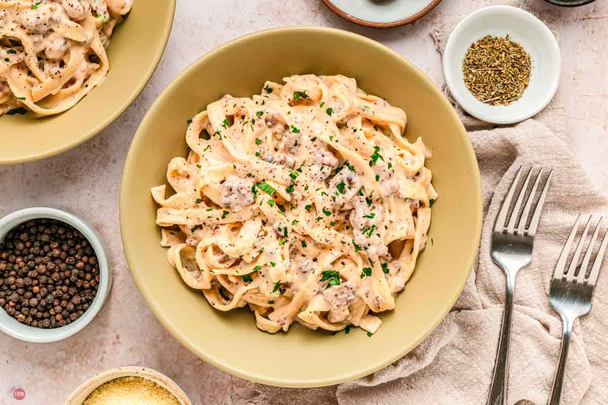 bowl of ground beef and pasta in a cream sauce