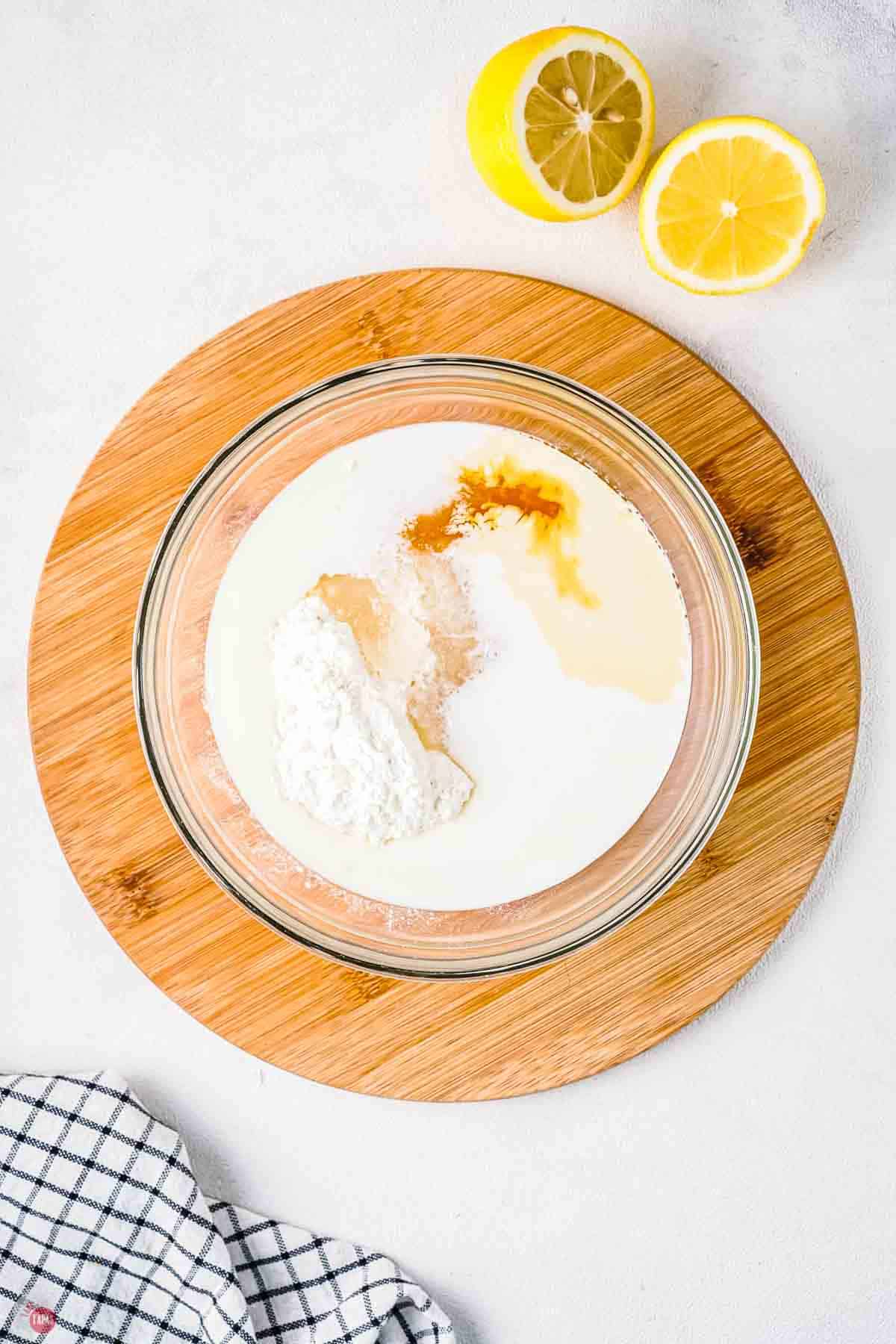 clear bowl with cake batter in it